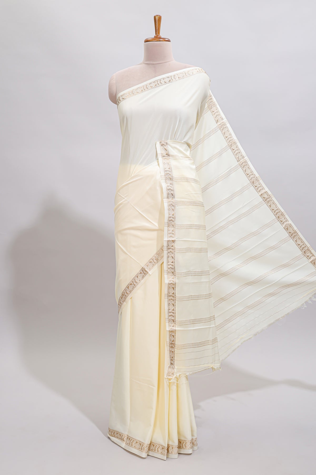 Off white plain art mysore silk saree with self zari border and matching blouse
