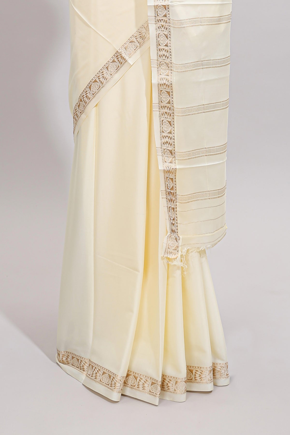 Off white plain art mysore silk saree with self zari border and matching blouse