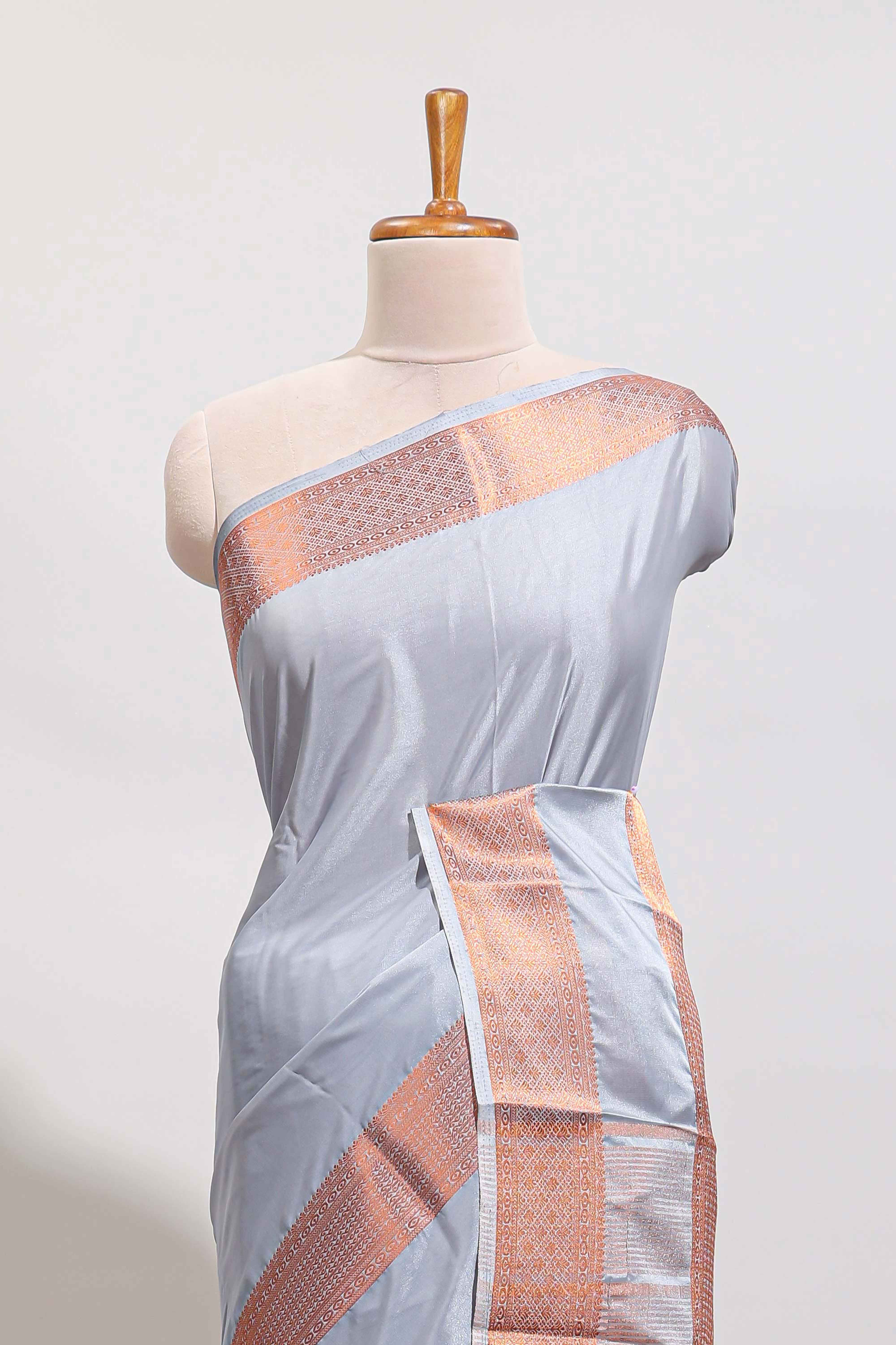 Sky blue plain art mysore silk saree with contrast zari border and matching blouse