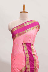 Peach butta designed art mysore silk saree with contrast zari border and blouse