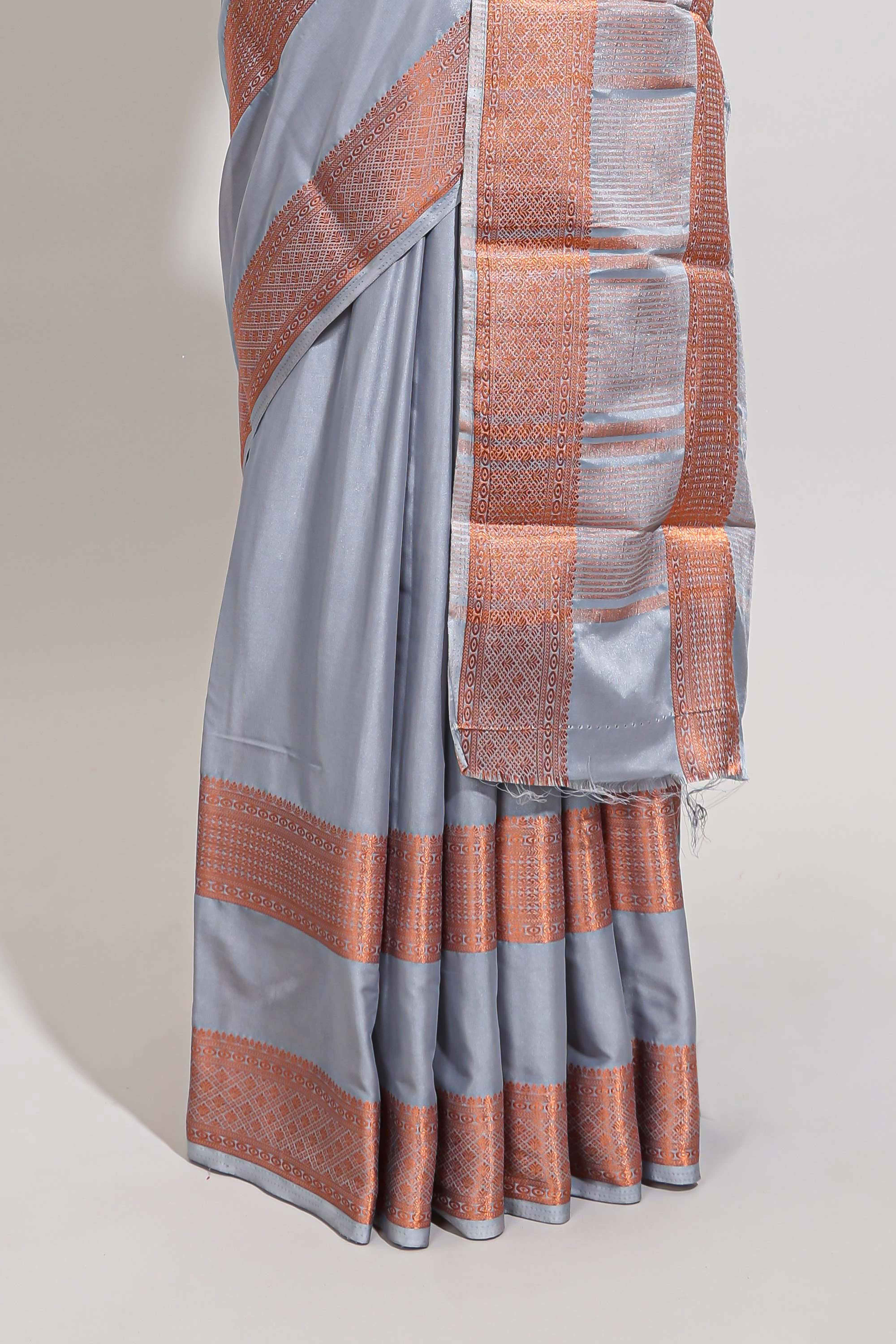Sky blue plain art mysore silk saree with contrast zari border and matching blouse