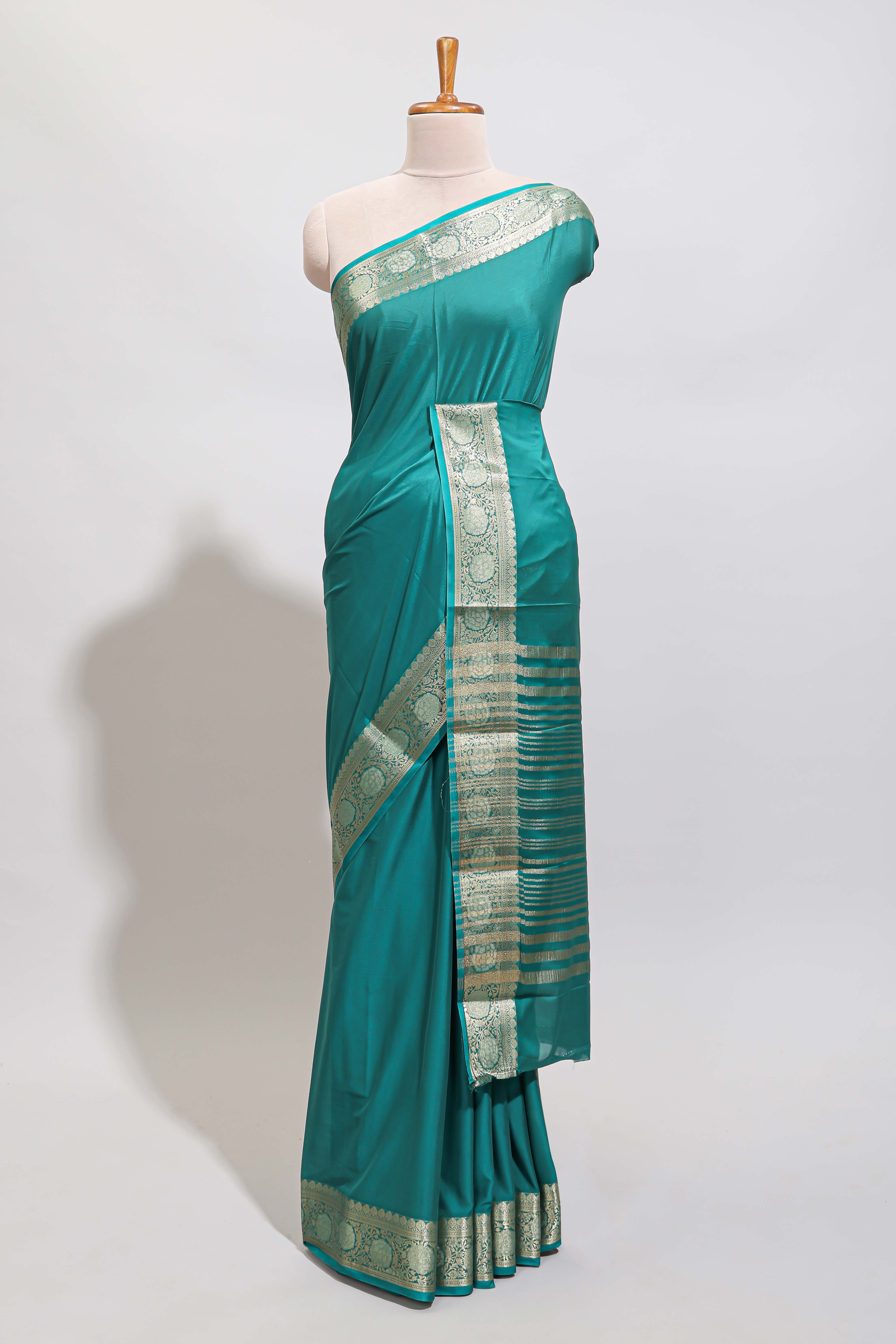 Green plain art mysore silk saree with self zari border and matching blouse