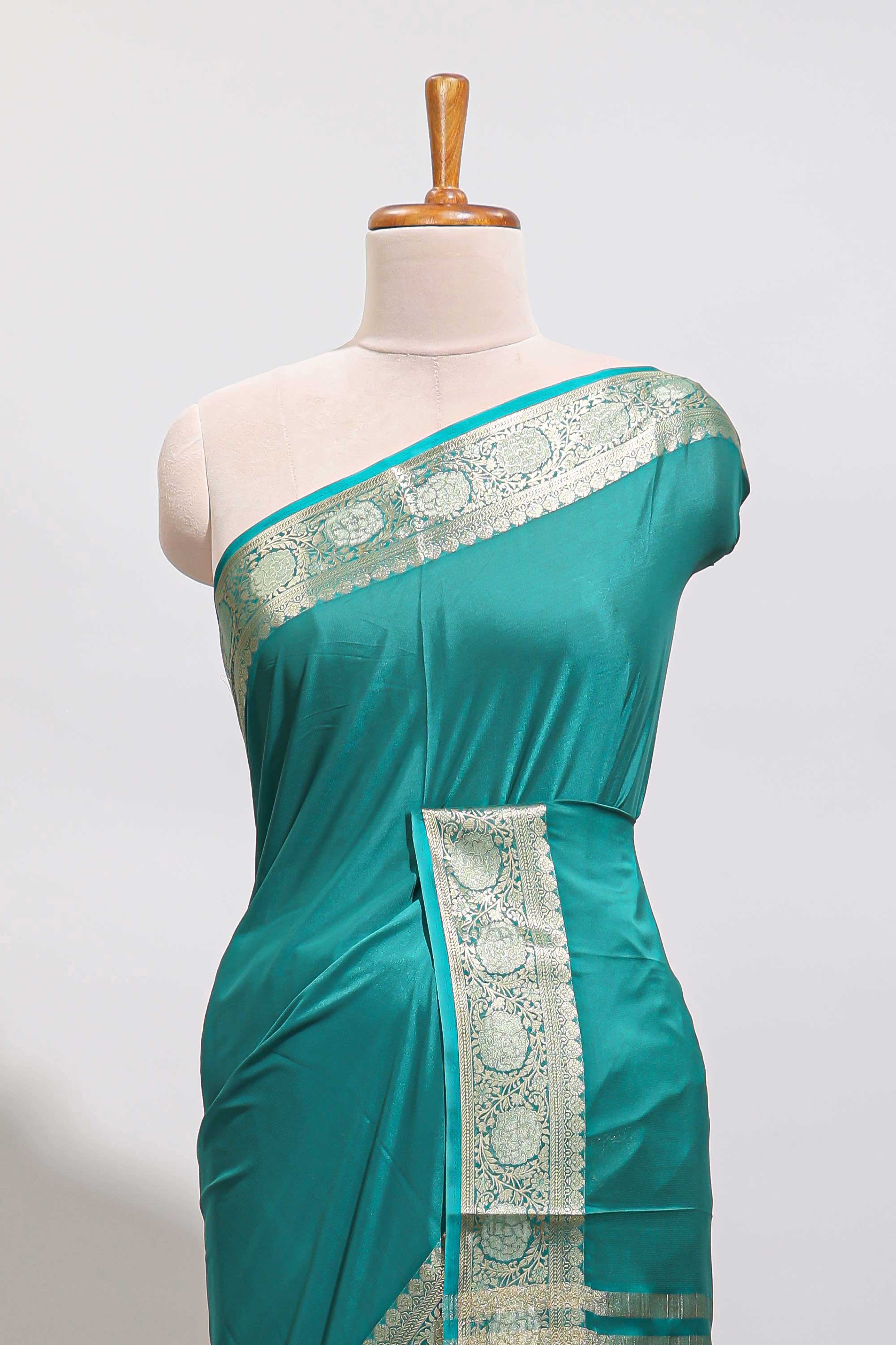 Green plain art mysore silk saree with self zari border and matching blouse