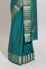Green plain art mysore silk saree with self zari border and matching blouse