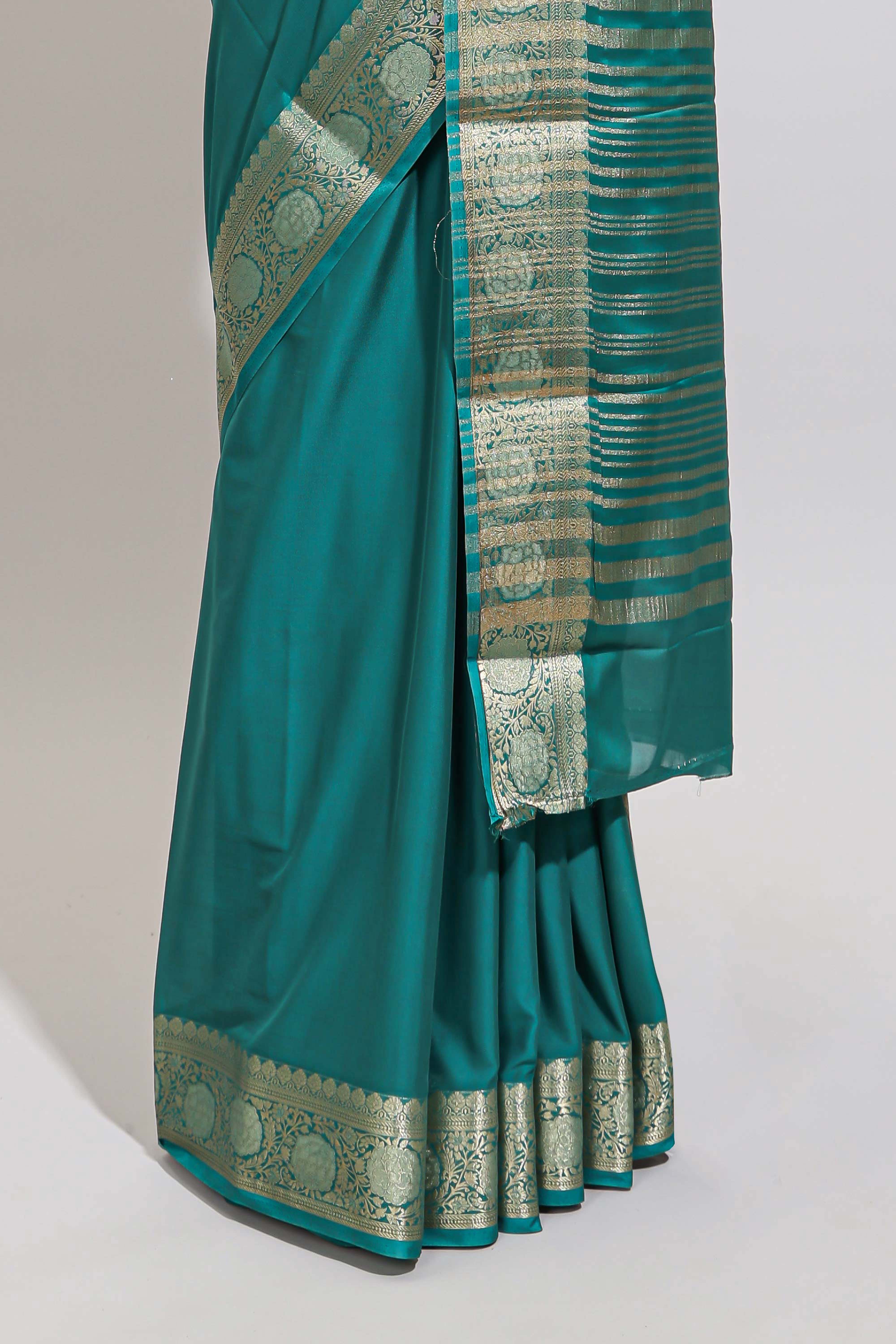 Green plain art mysore silk saree with self zari border and matching blouse