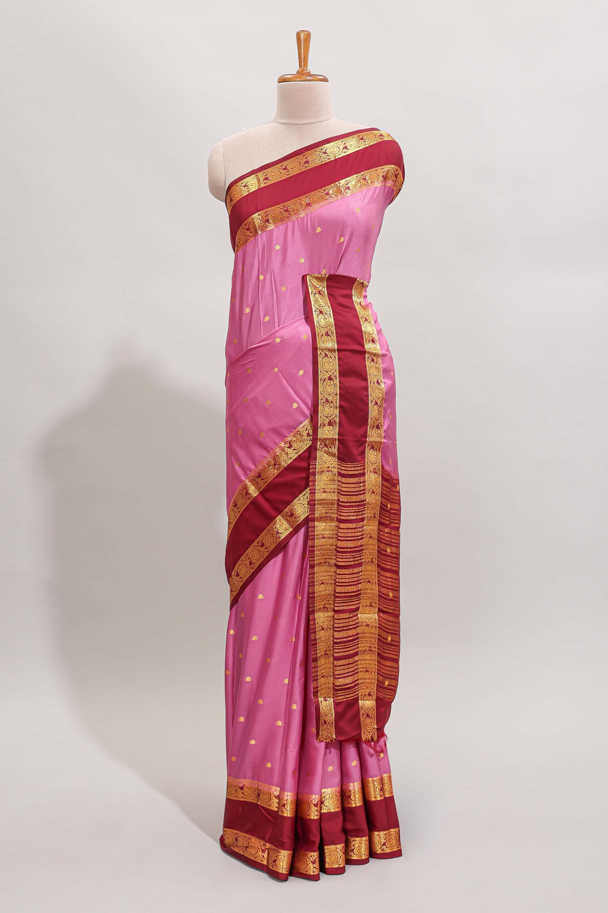 Pink butta designed art mysore silk saree with contrast zari border and blouse