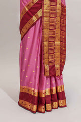 Pink butta designed art mysore silk saree with contrast zari border and blouse