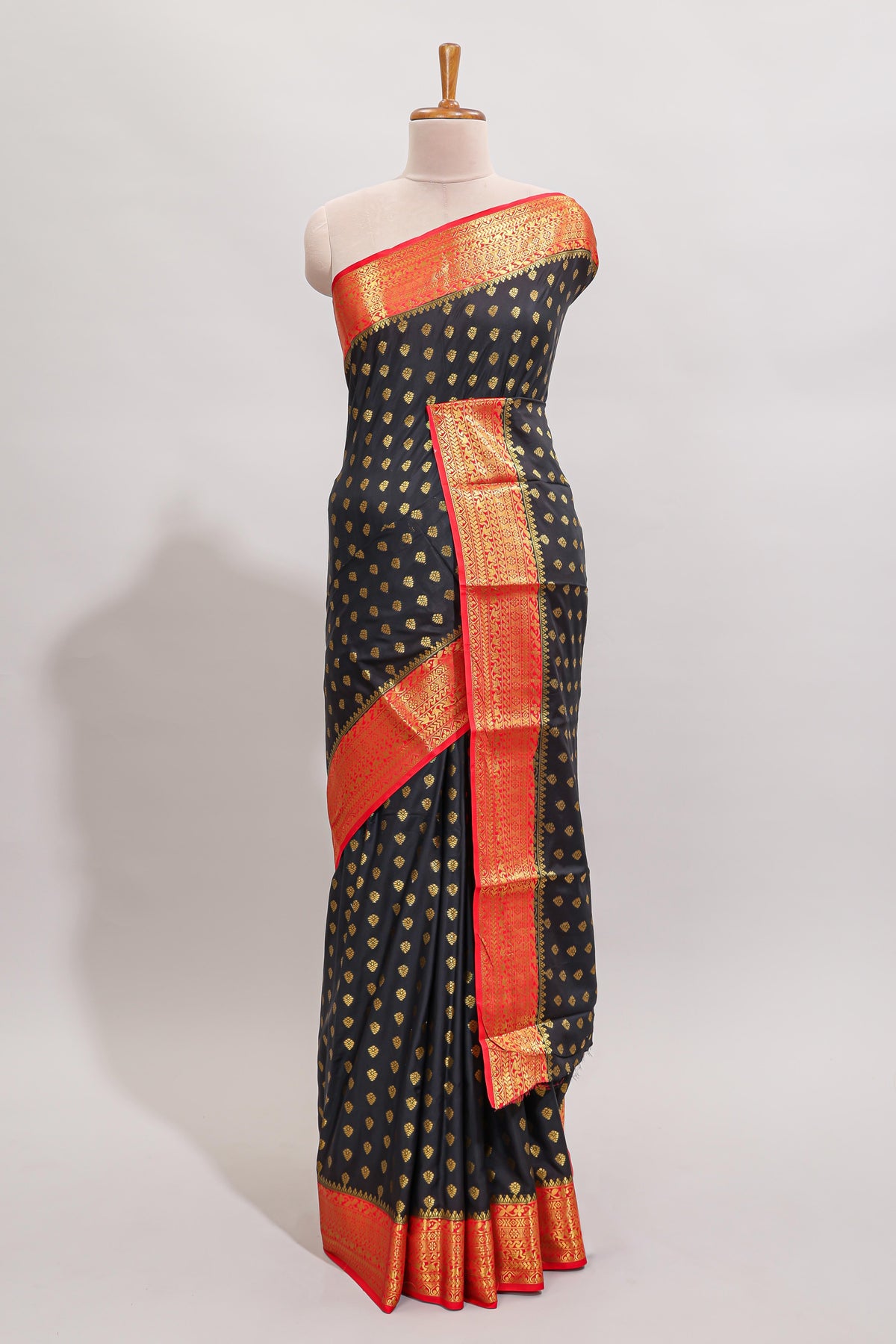 Black butta designed art mysore silk saree with contrast zari border and blouse