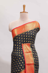 Black butta designed art mysore silk saree with contrast zari border and blouse