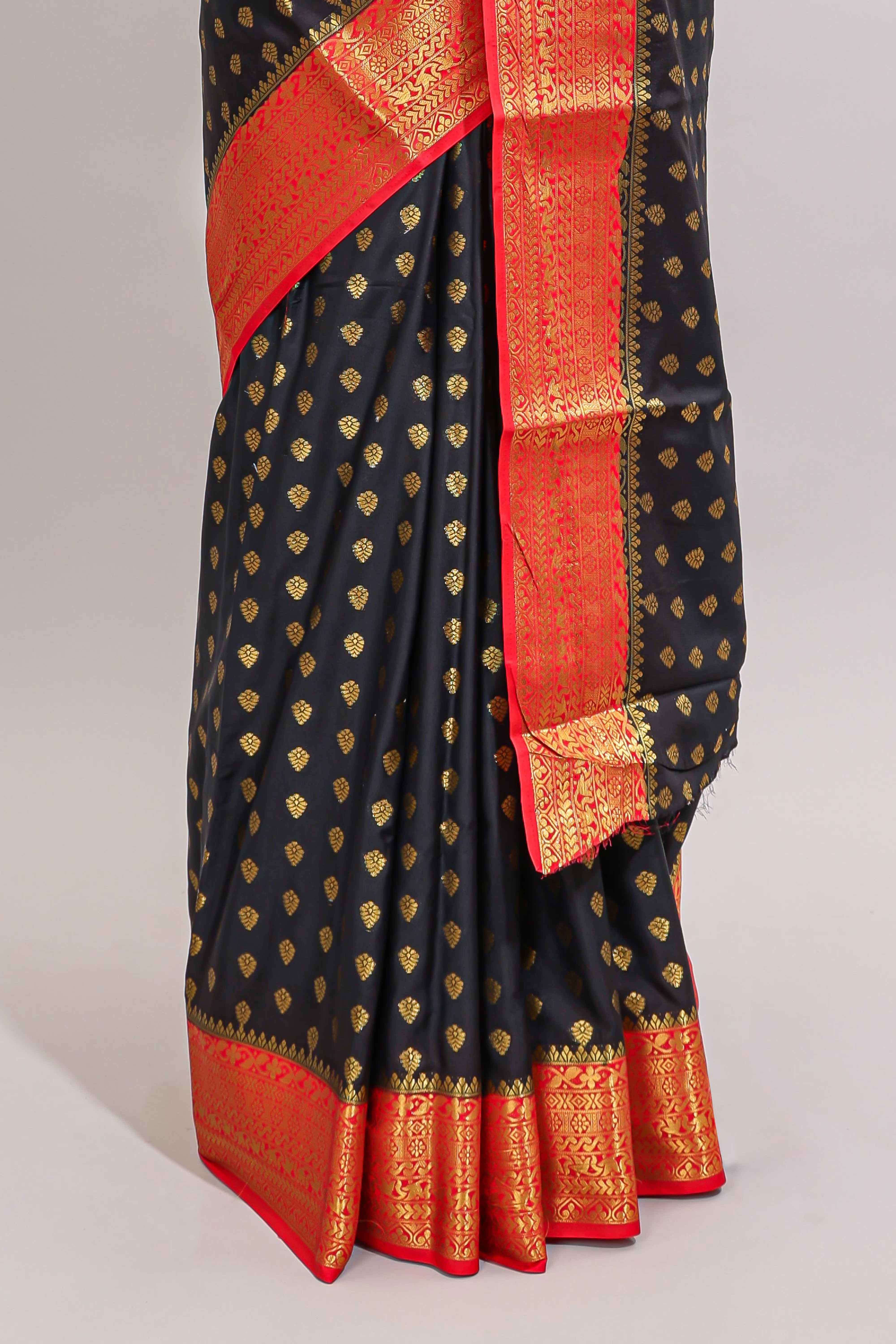 Black butta designed art mysore silk saree with contrast zari border and blouse