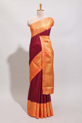 Maroon plain art mysore silk saree with contrast zari border and blouse