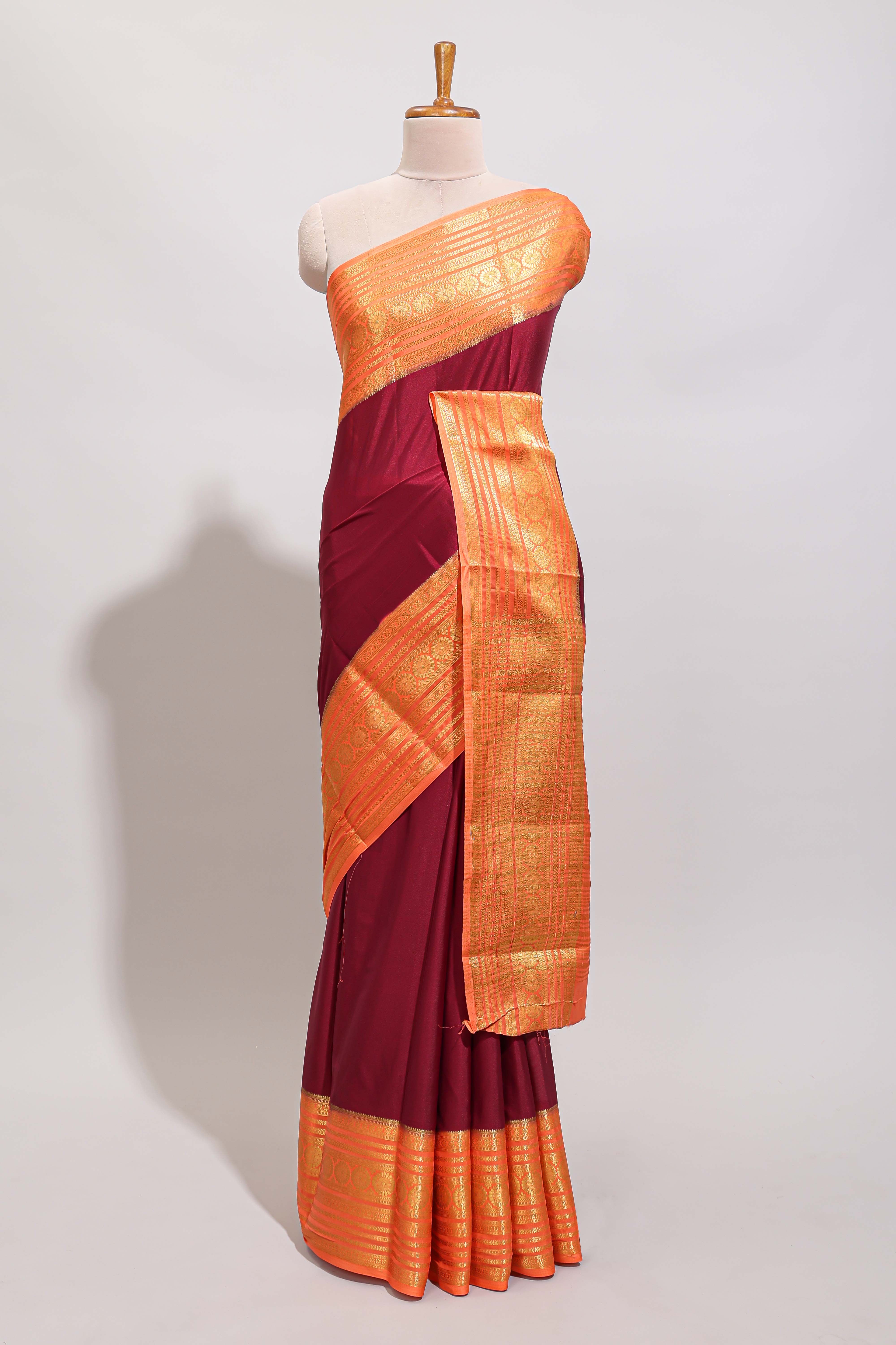 Maroon plain art mysore silk saree with contrast zari border and blouse