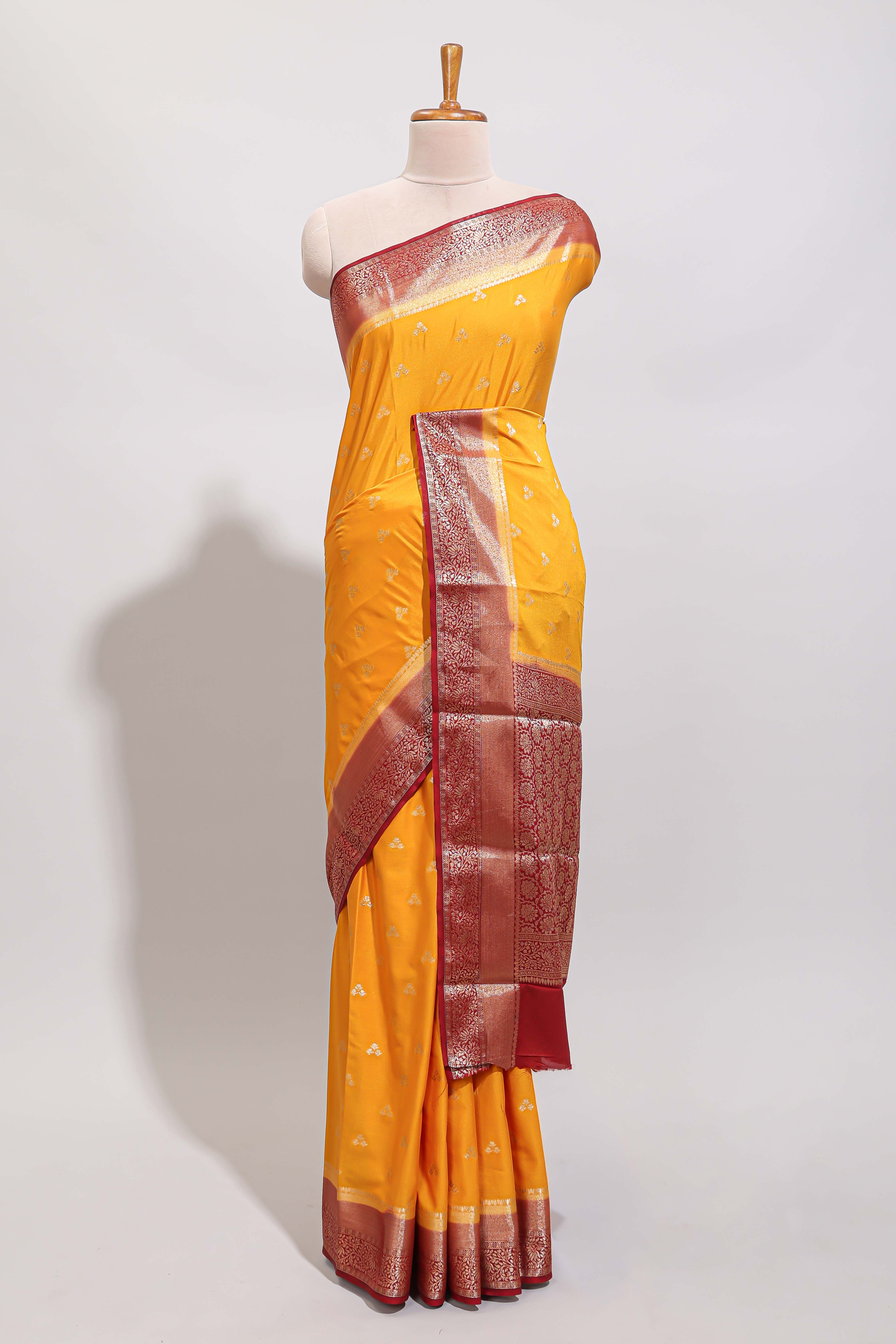 Orange zari motifs design art mysore silk saree with contrast zari border and blouse