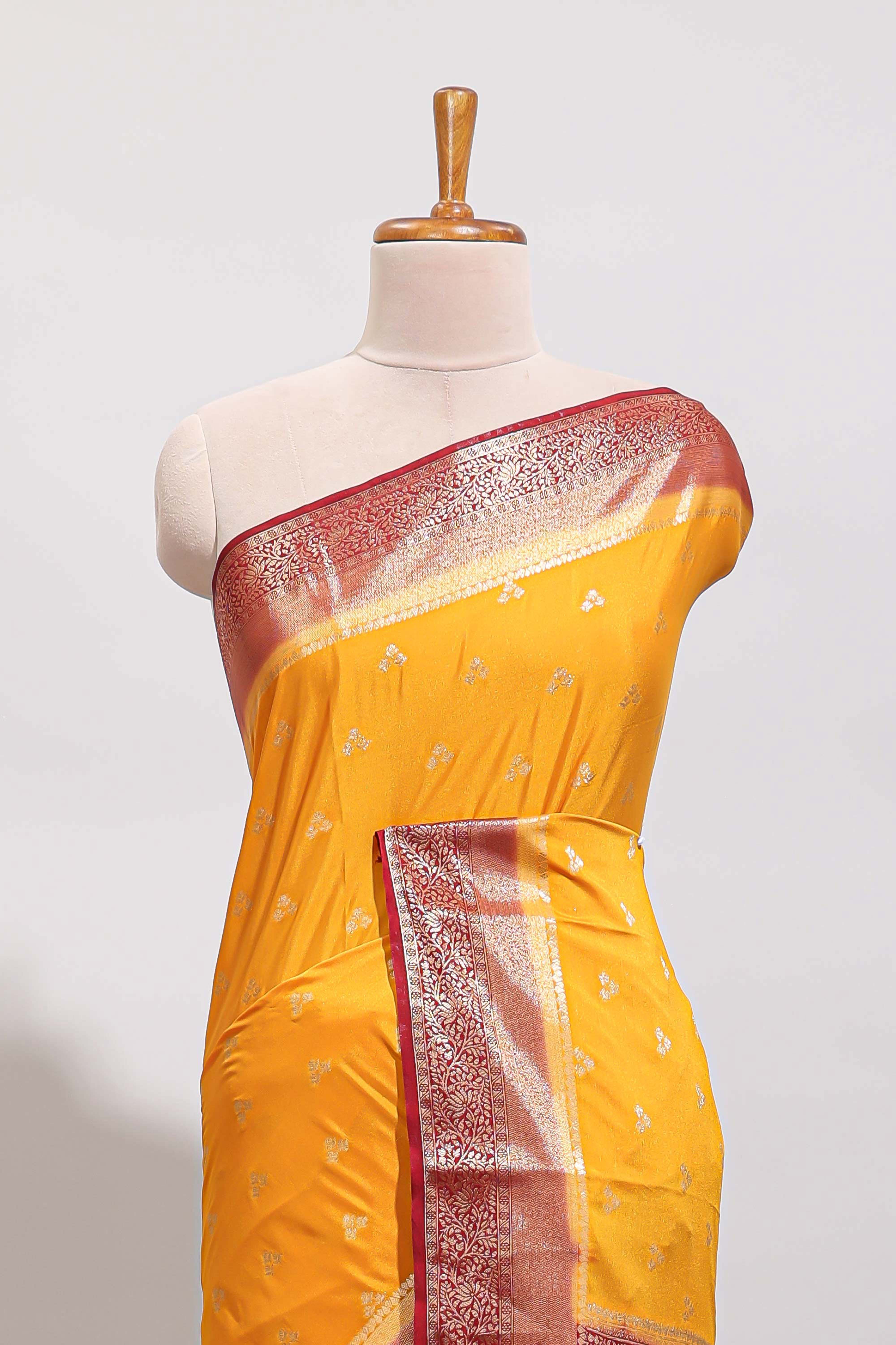 Orange zari motifs design art mysore silk saree with contrast zari border and blouse