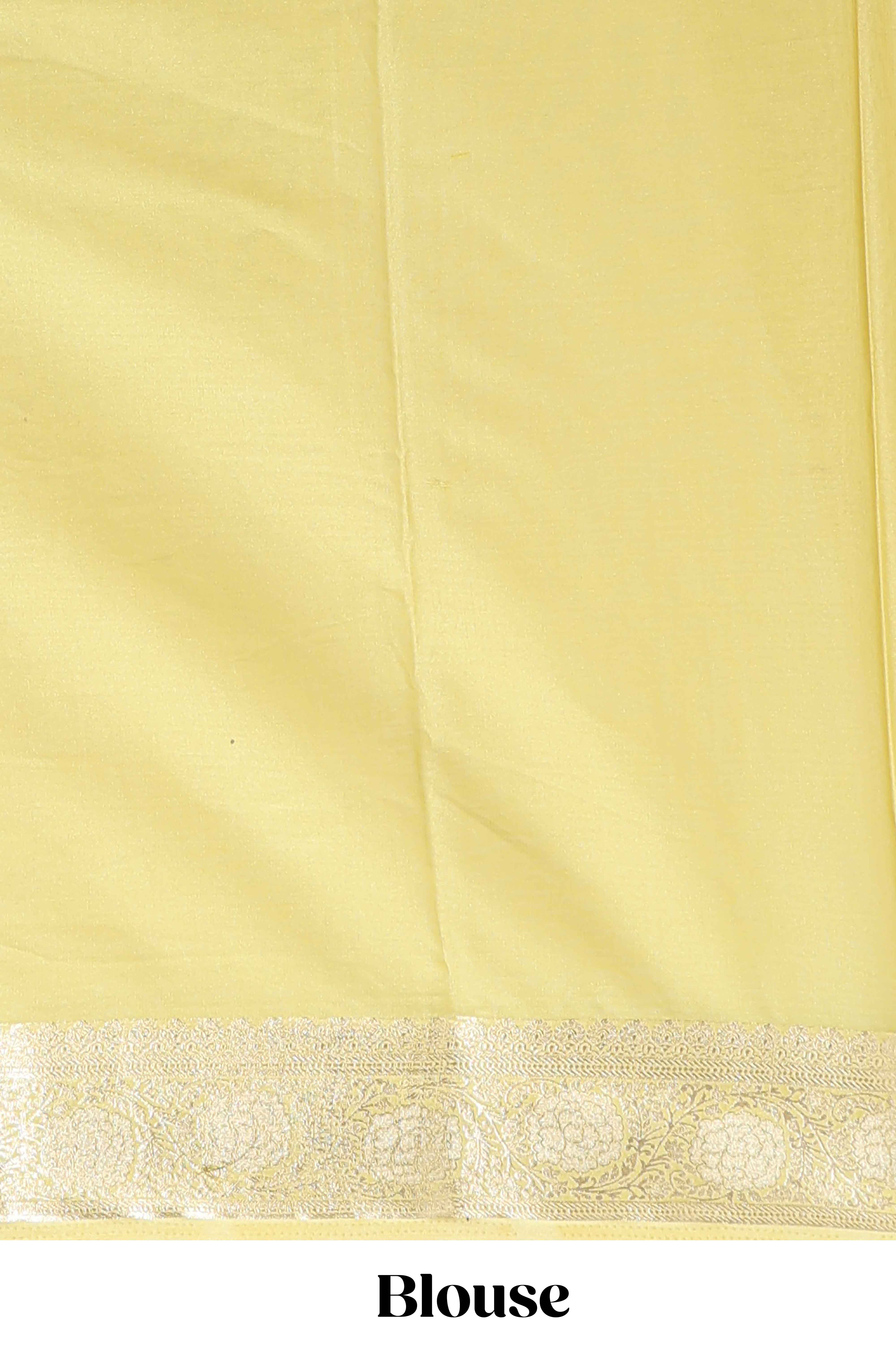 Pale yellow plain design art mysore silk saree with self zari border and matching blouse