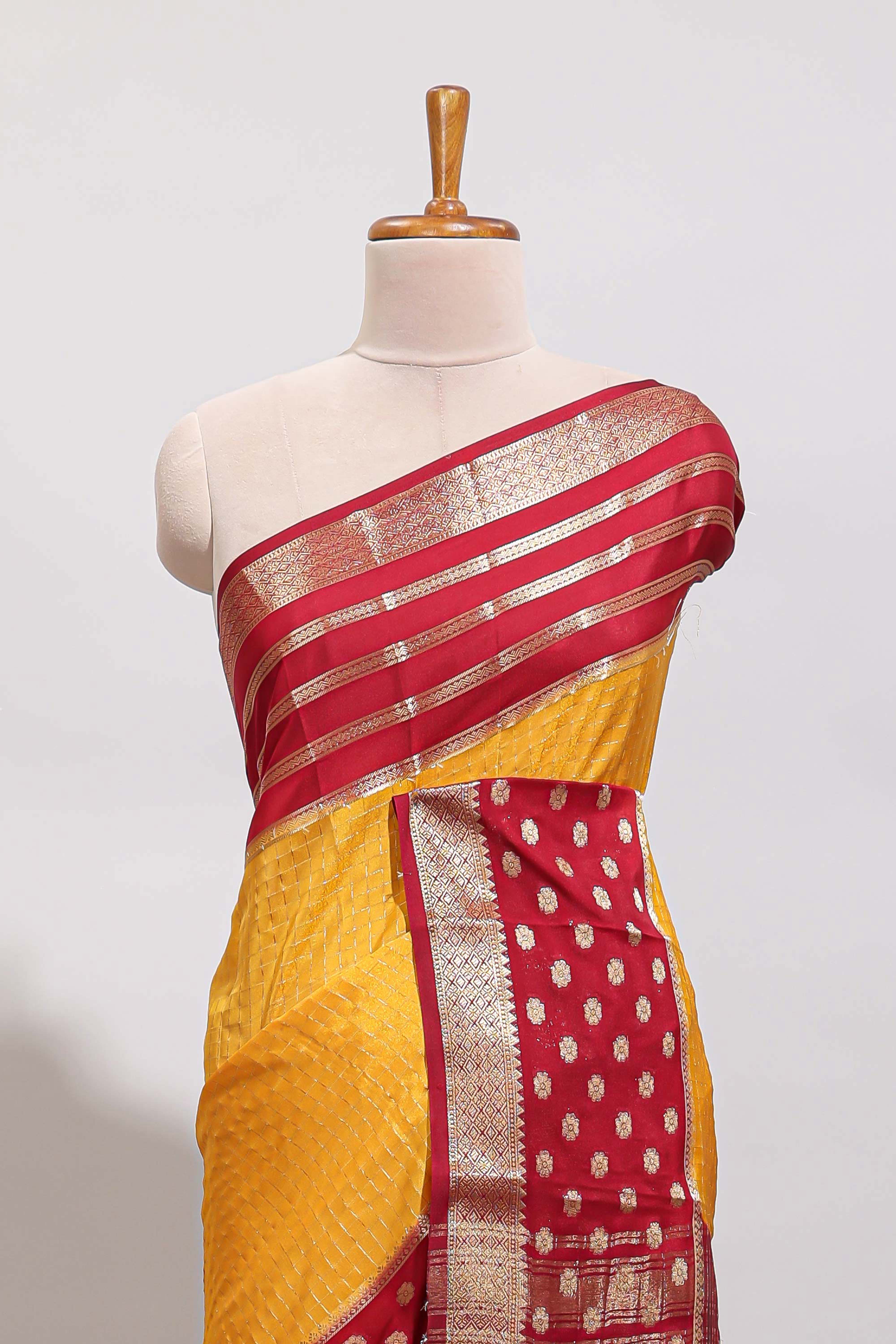 Orange checked zari design art mysore silk saree with contrast zari border and checked blouse