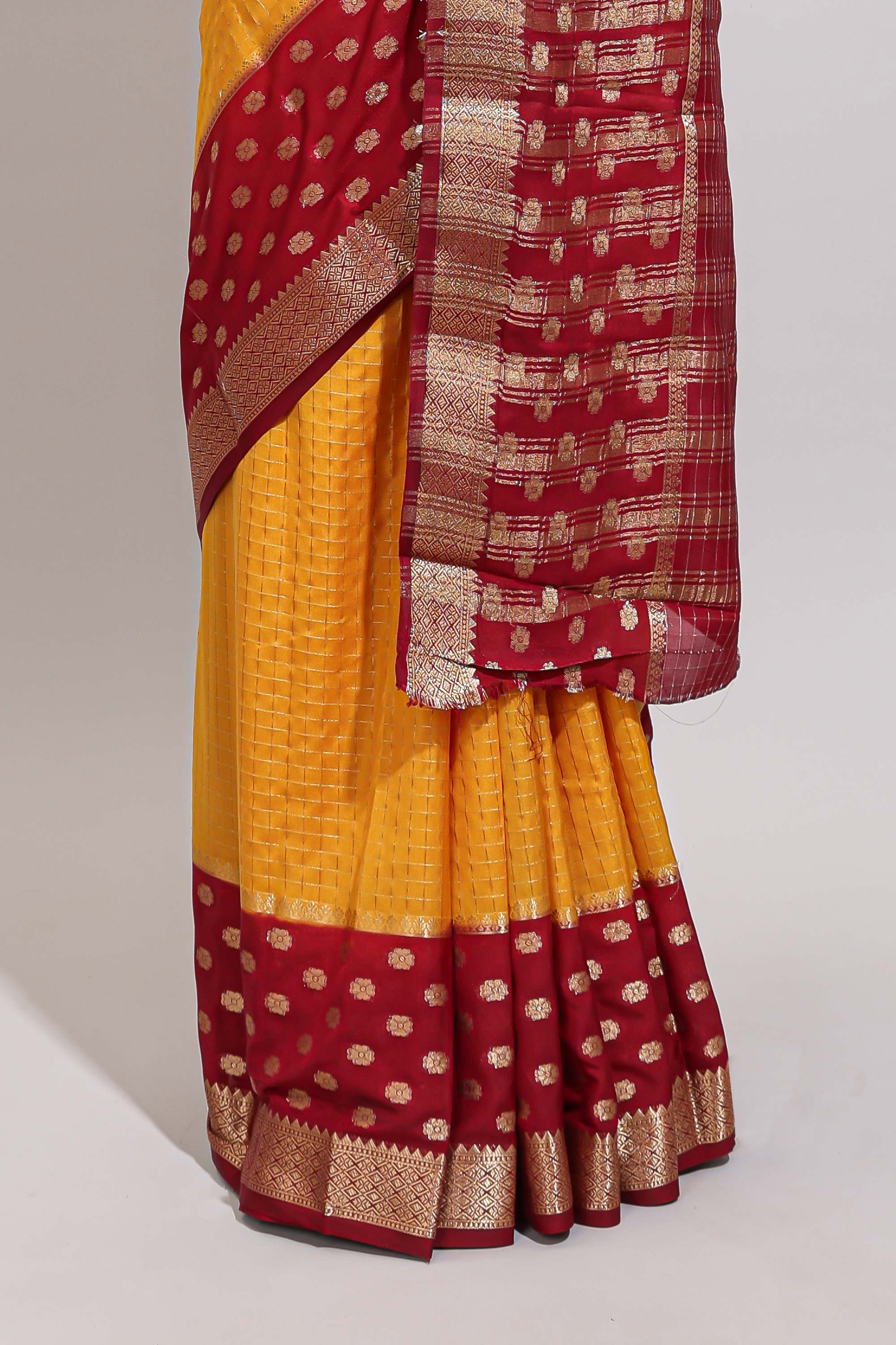 Orange checked zari design art mysore silk saree with contrast zari border and checked blouse