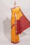 Yellow checked zari motifs design art mysore silk saree with contrast zari border and checked blouse