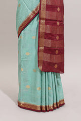 Turquoise green checked zari motifs design art mysore silk saree with contrast zari border and checked blouse