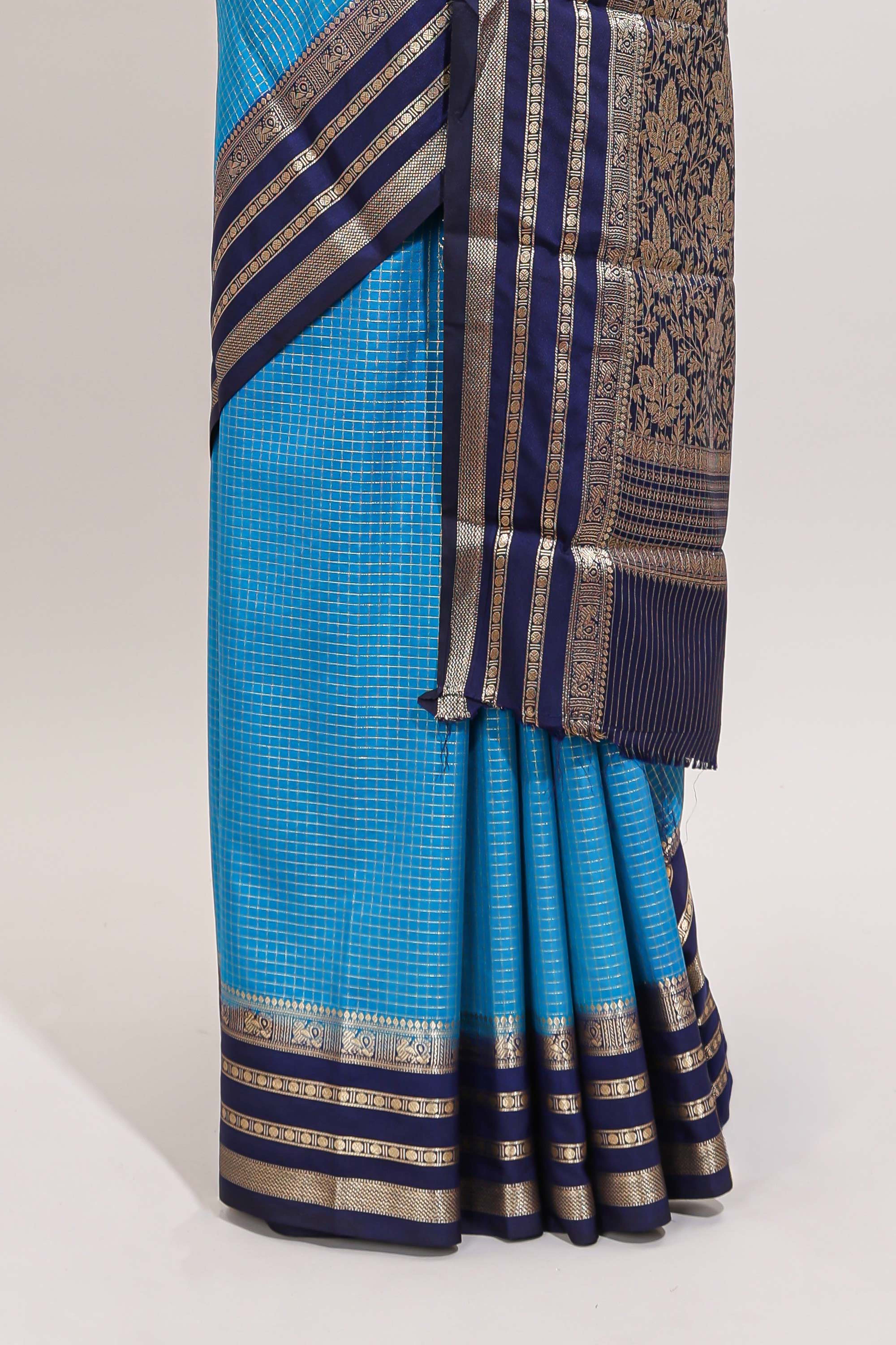 Blue checked design art mysore silk saree with contrast zari border and checked blouse