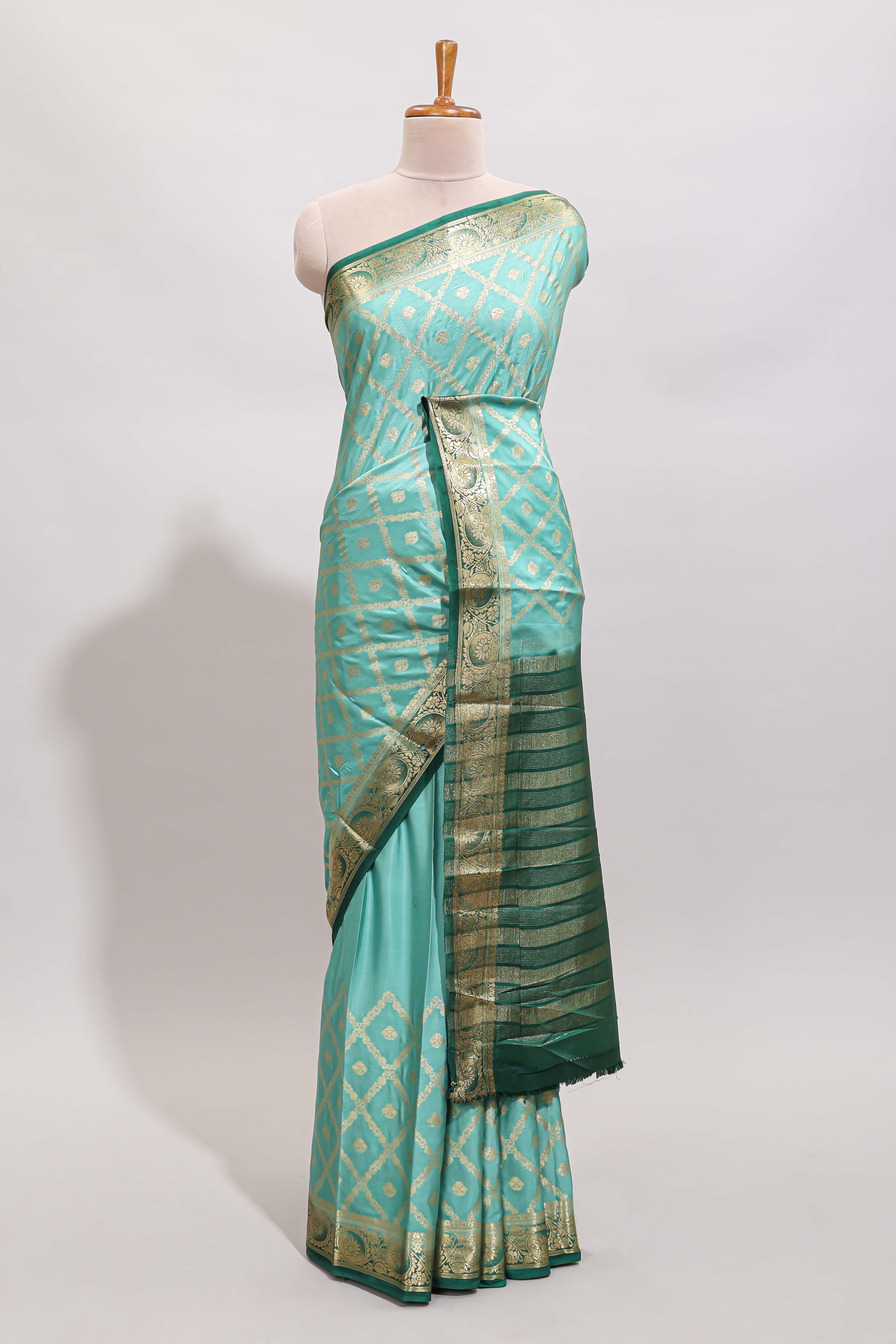 Green geometric zari motifs design art mysore silk saree with contrast zari border and blouse
