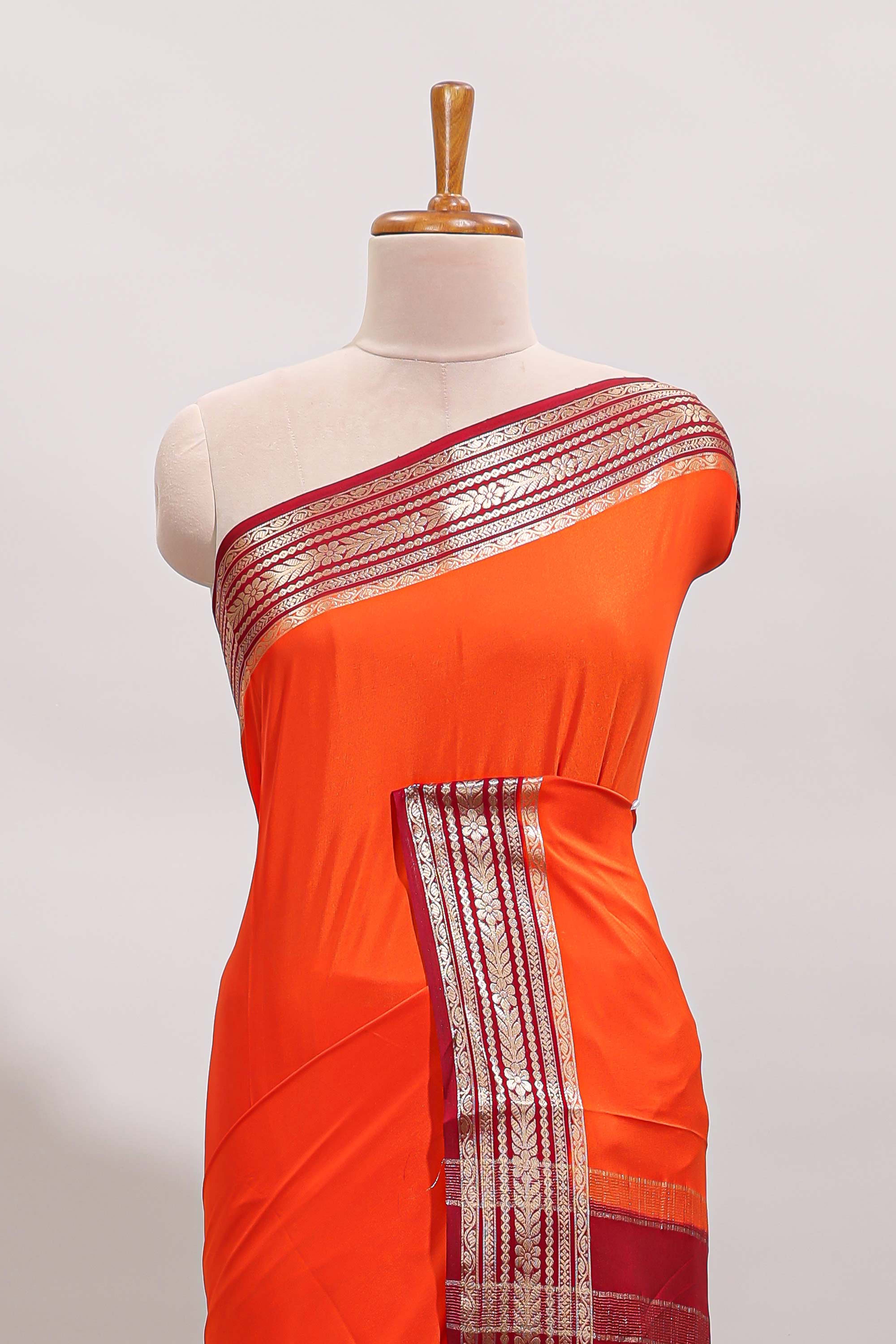 Orange plain design art mysore silk saree with contrast zari border and blouse