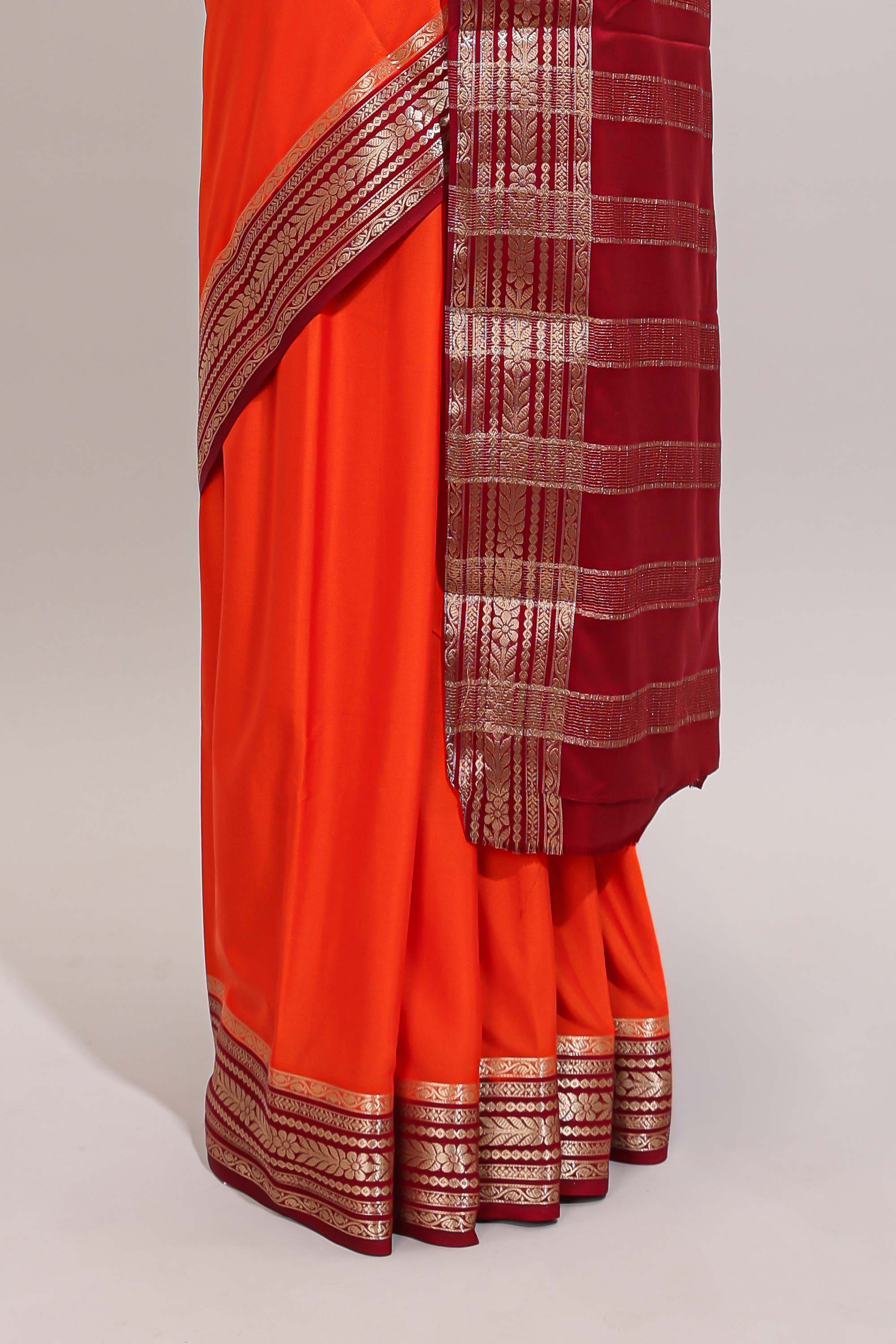 Orange plain design art mysore silk saree with contrast zari border and blouse