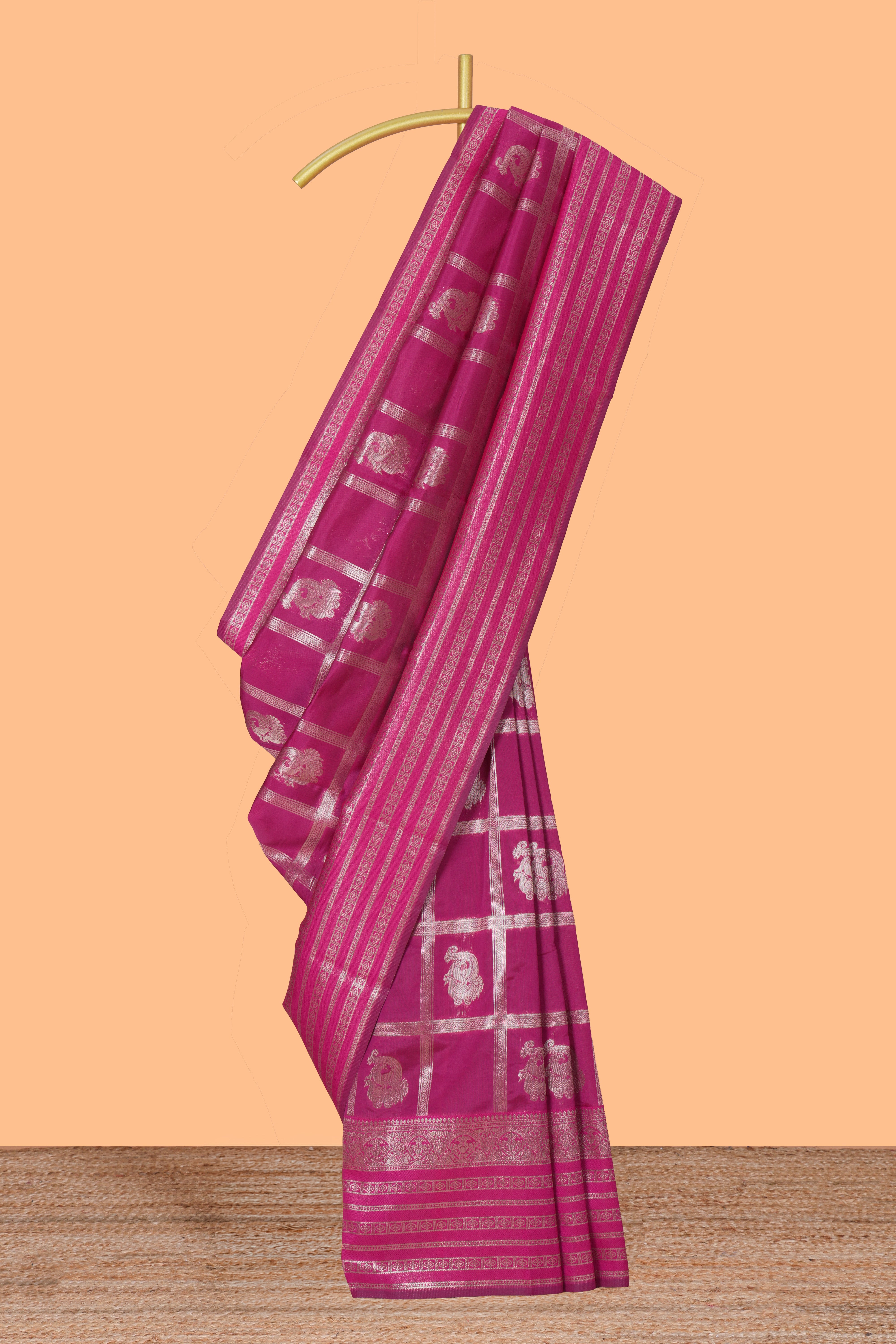 Magenta checked zari motifs art silk saree with self zari border and matching zari motifs blouse