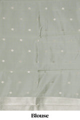 Pale green checked zari motifs art silk saree with self zari border and matching zari motifs blouse