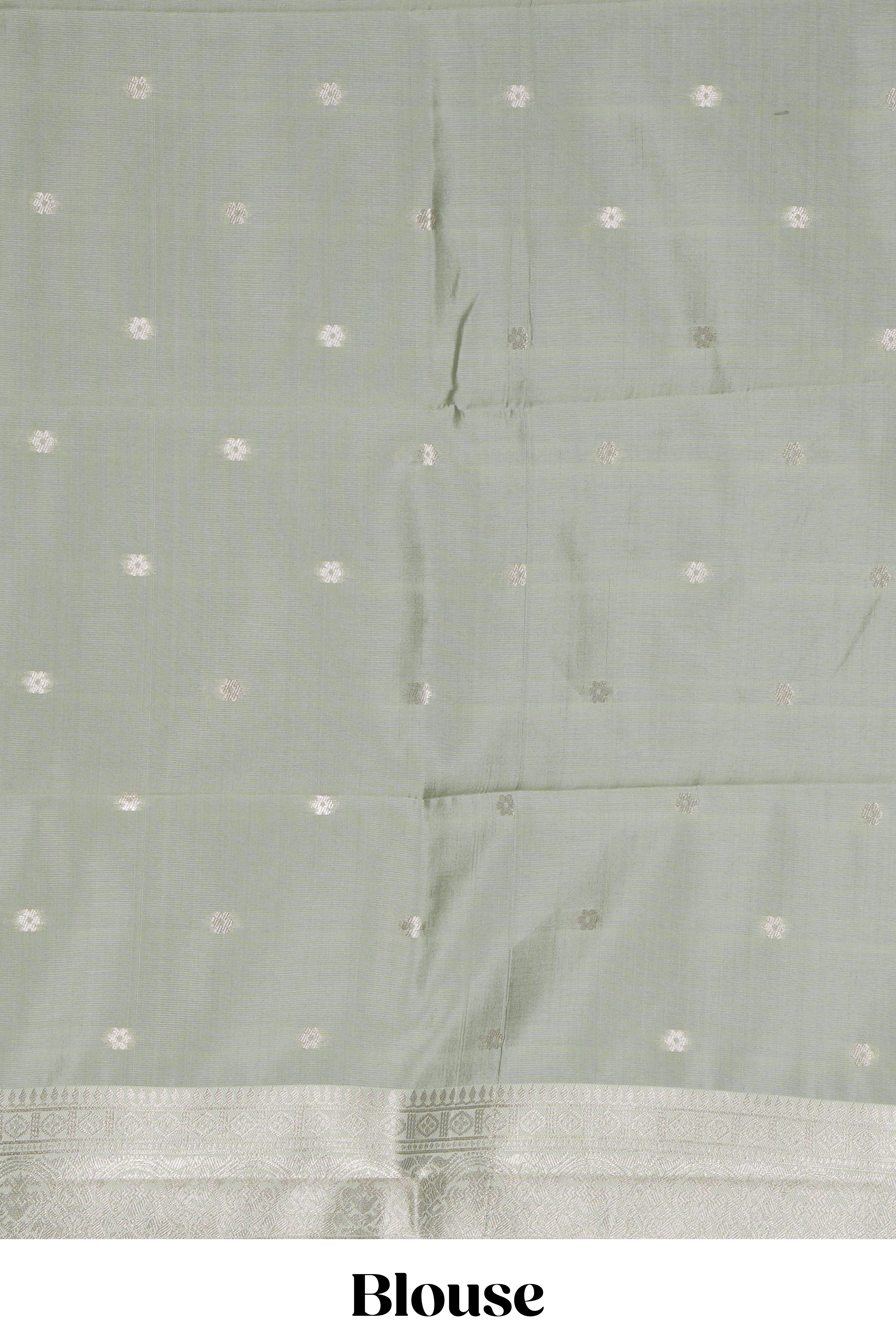Pale green checked zari motifs art silk saree with self zari border and matching zari motifs blouse