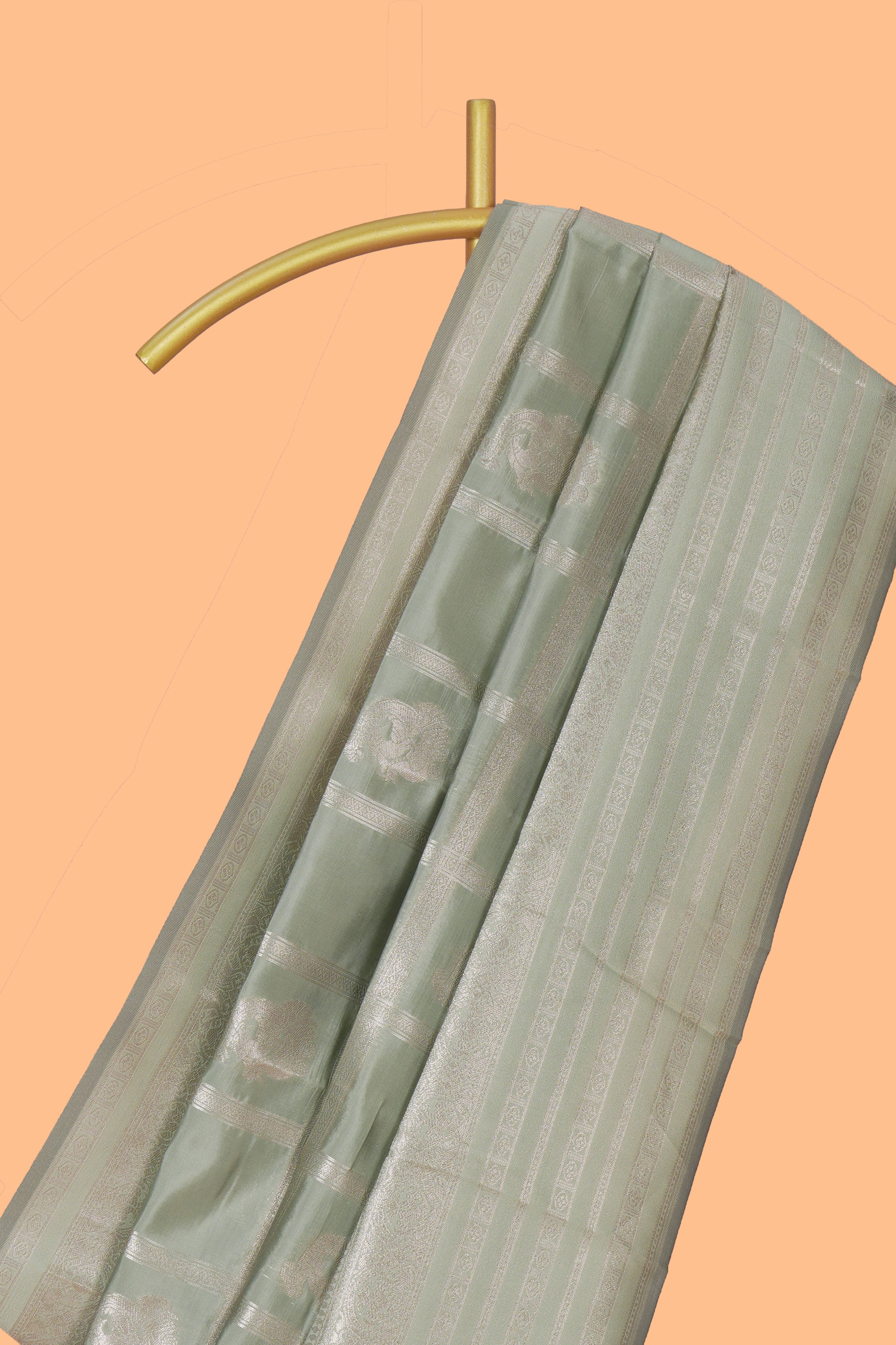 Pale green checked zari motifs art silk saree with self zari border and matching zari motifs blouse