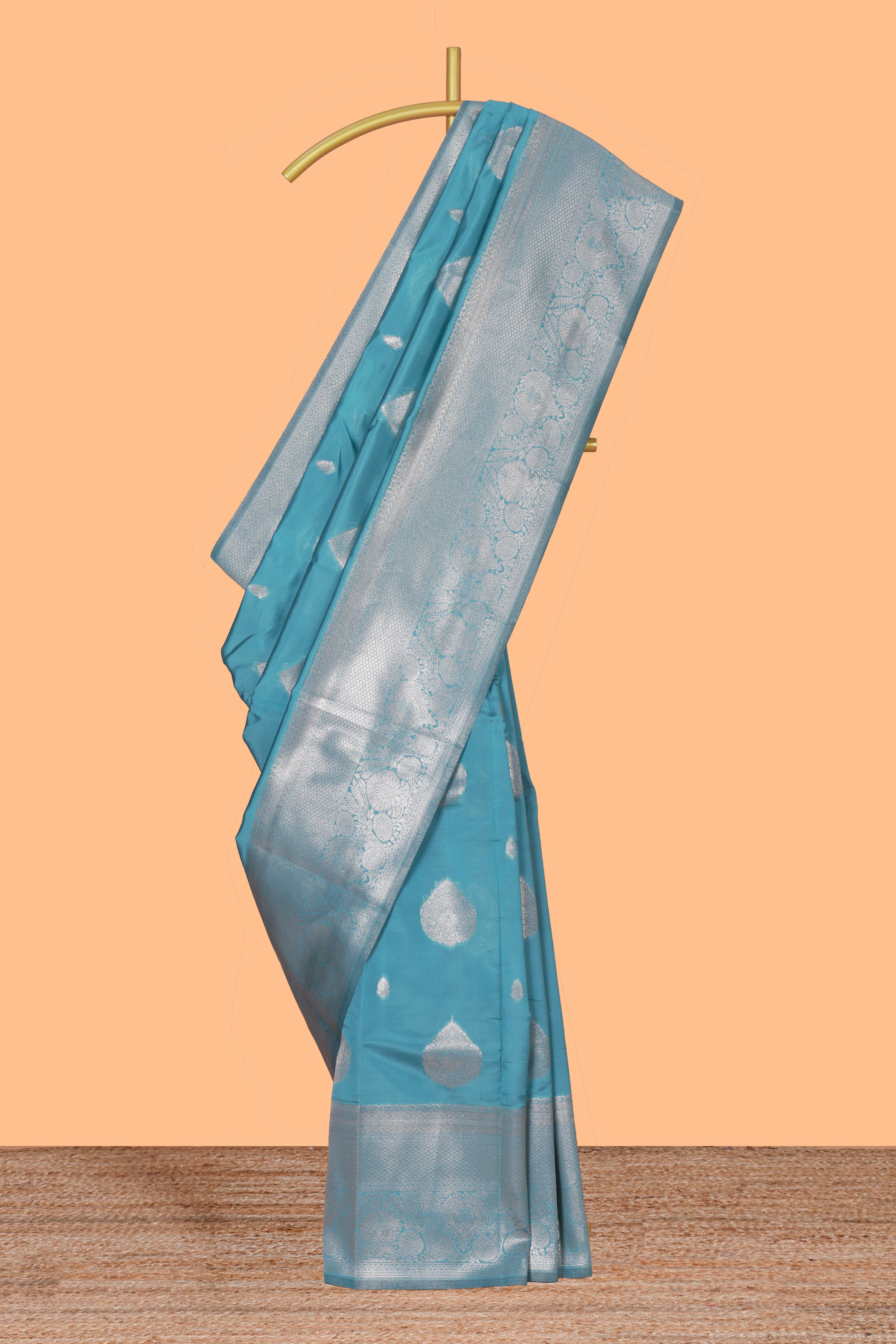 Blue zari motifs art silk saree with self zari border and matching zari motifs blouse