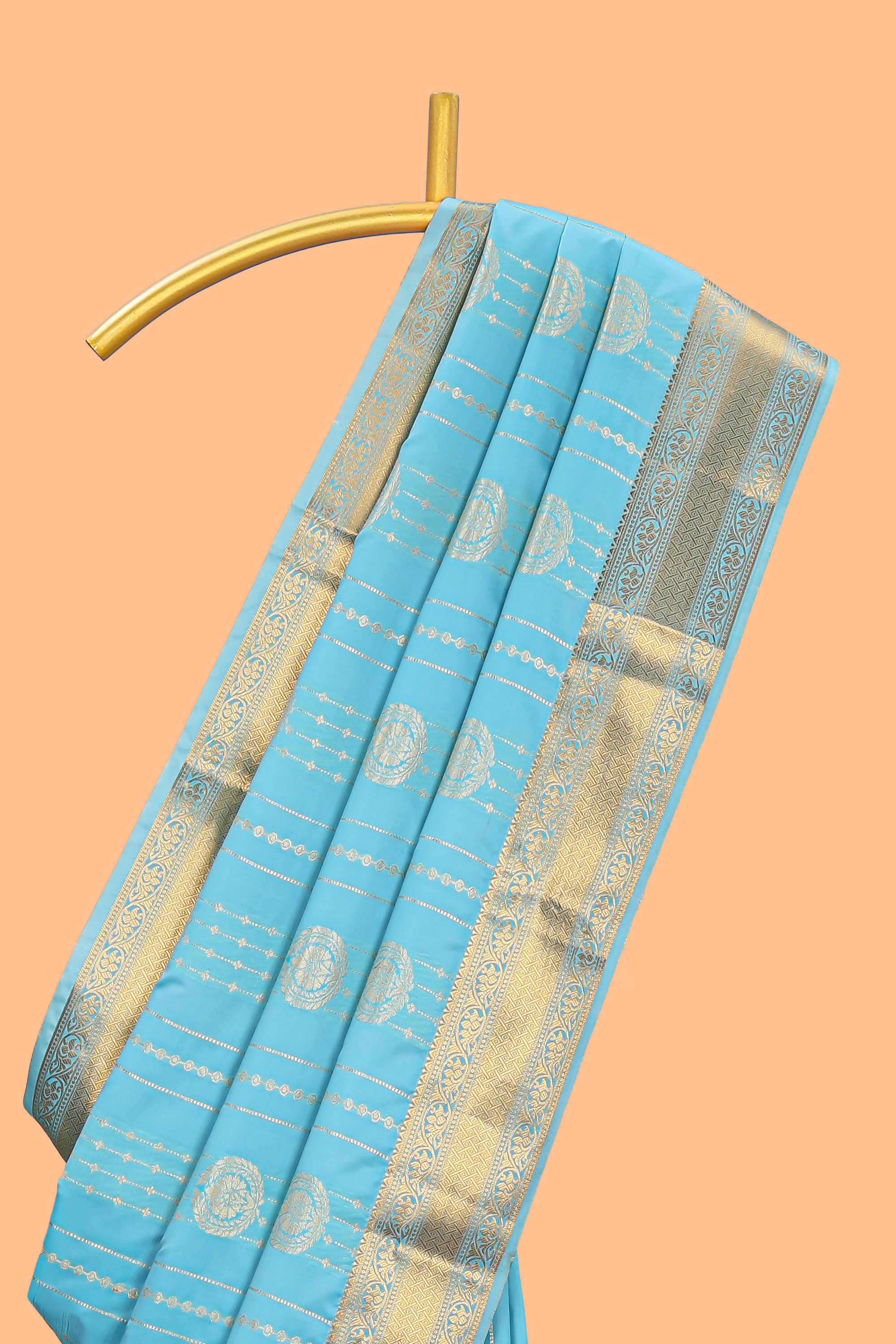 Turquoise blue striped zari motifs art silk saree with self zari border and matching blouse