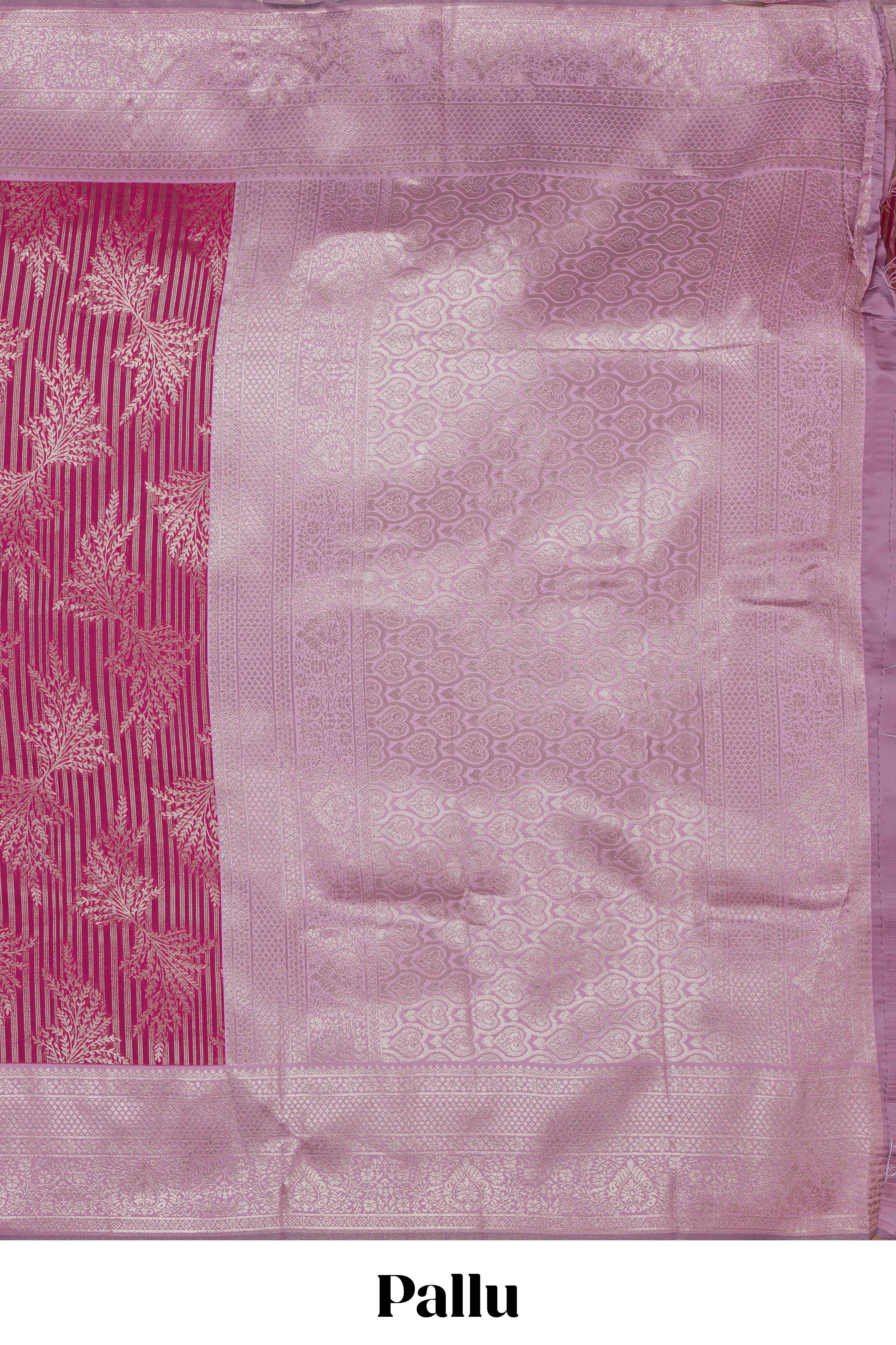 Pink striped floral design art silk saree with contrast zari border and zari motifs blouse