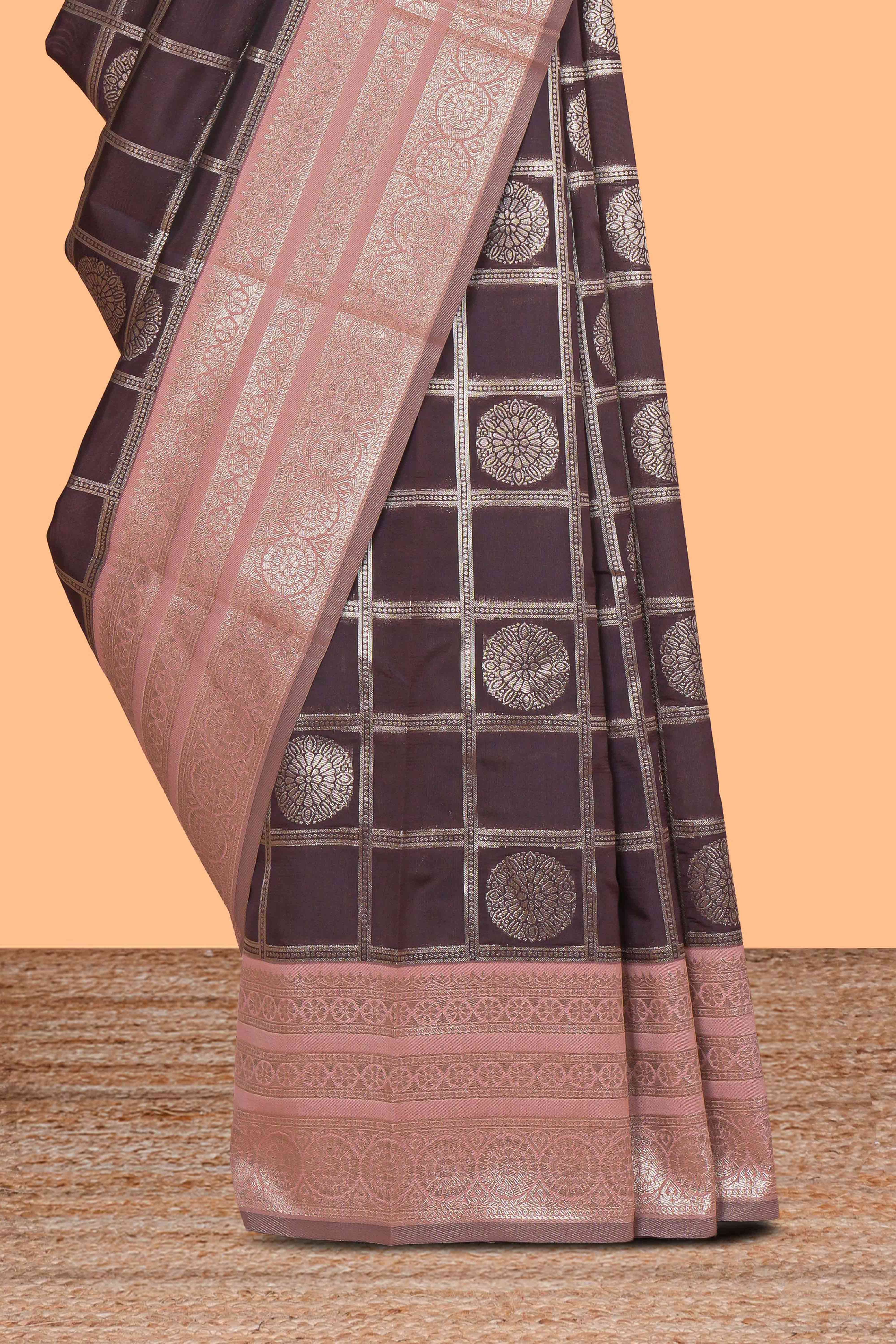 Dark brown floral moifs design art silk saree with contrast zari border and zari motifs blouse