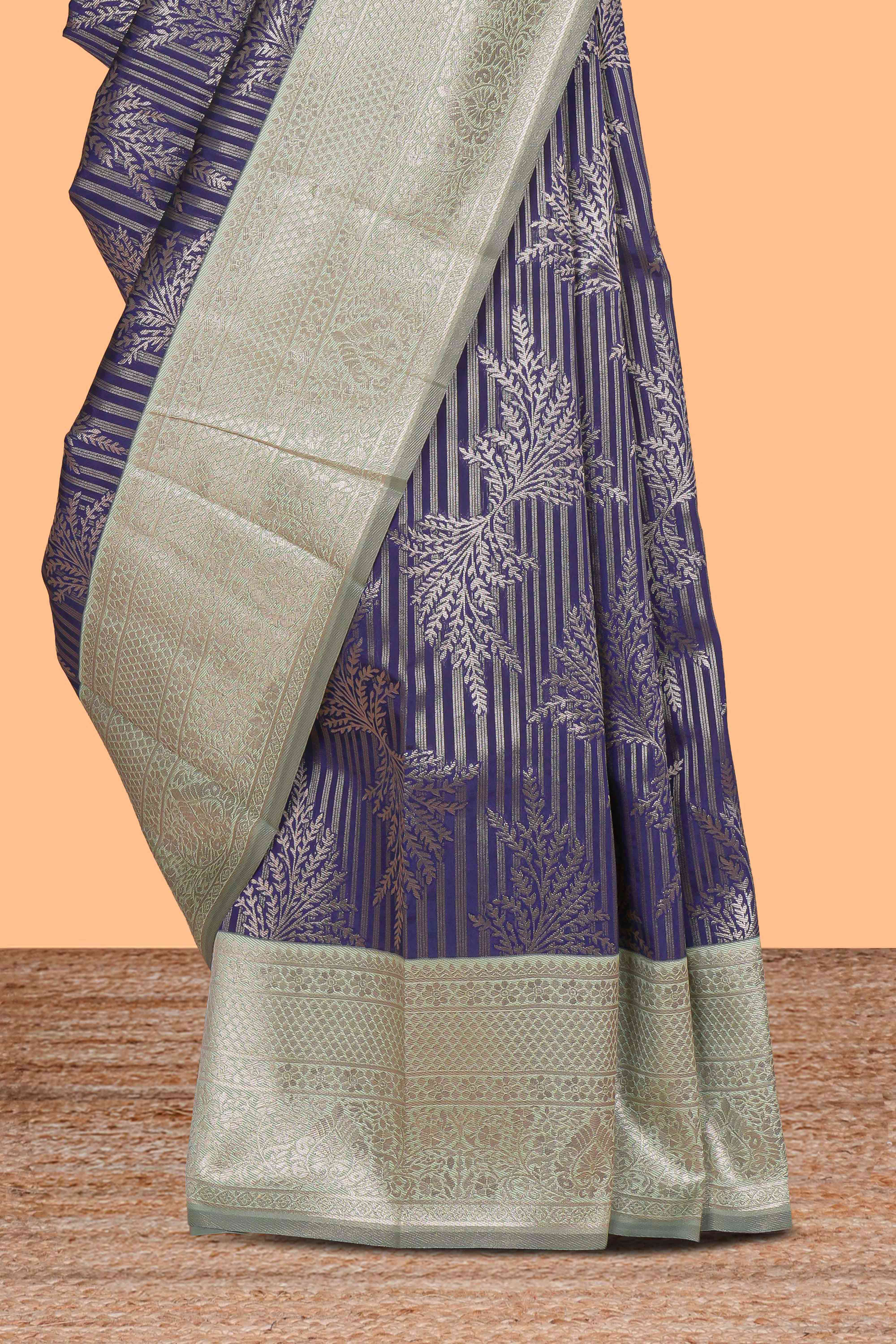 Violet striped floral design art silk saree with contrast zari border and zari motifs blouse