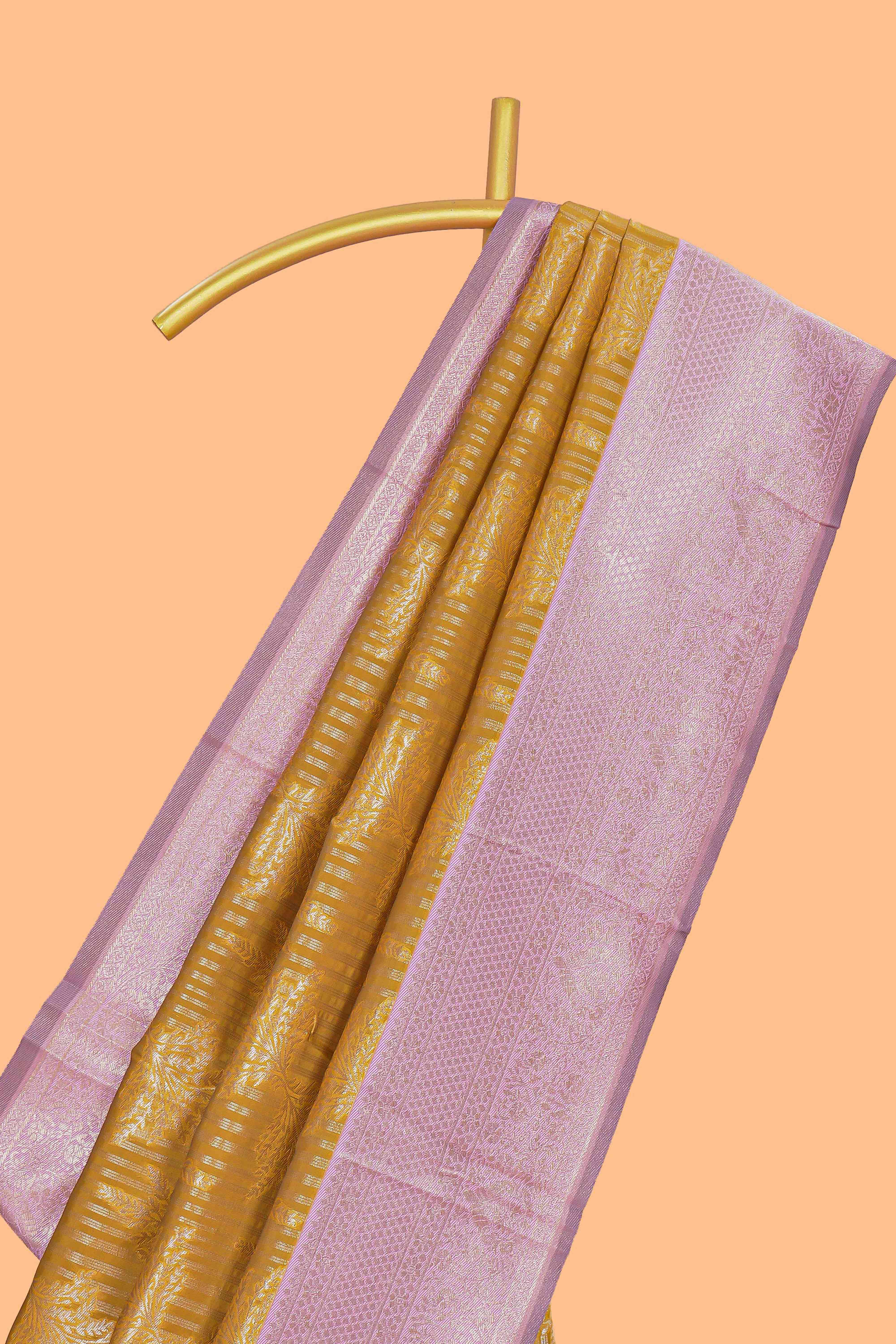 Mustard striped floral design art silk saree with contrast zari border and zari motifs blouse