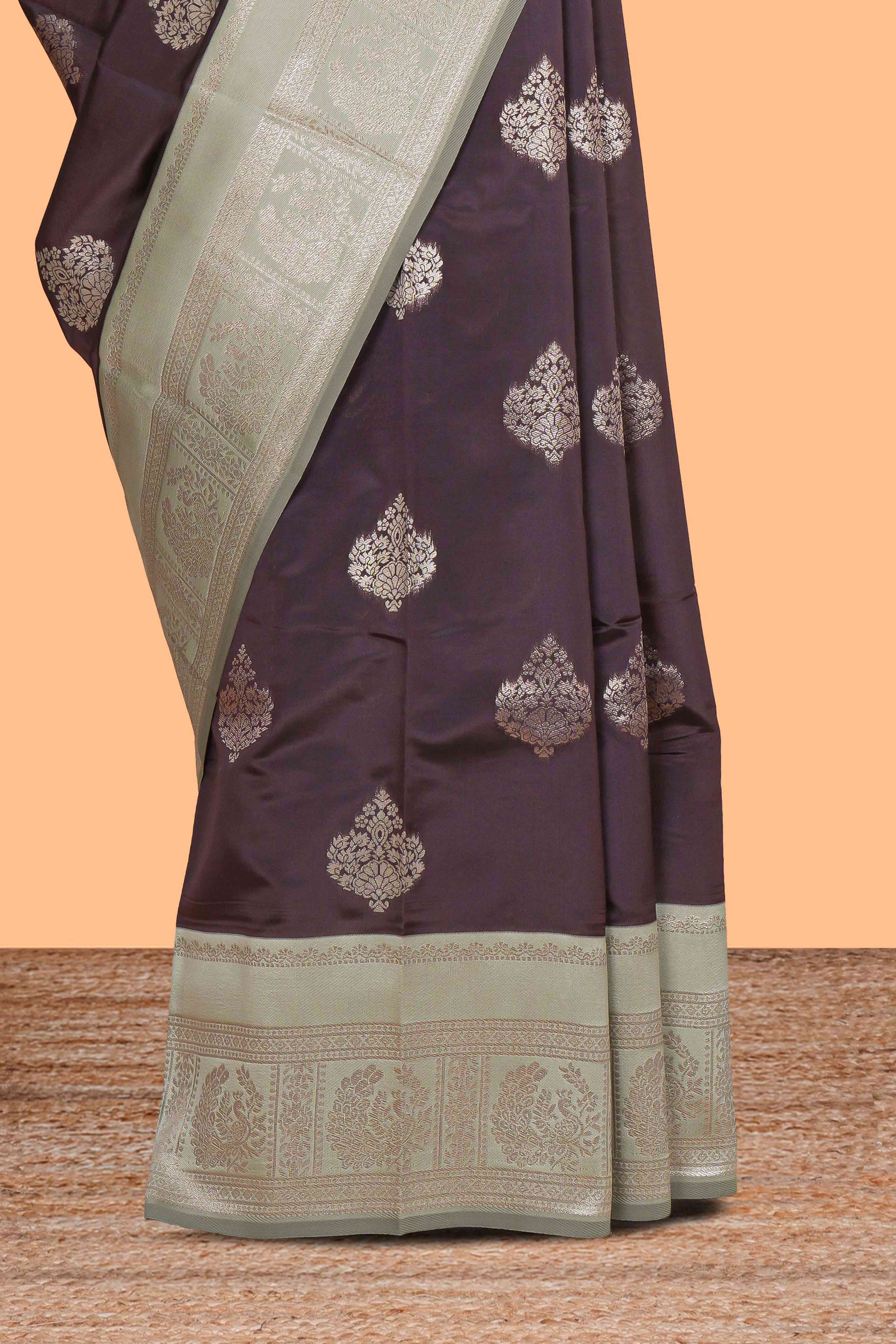 Dark brown floral motifs design art silk saree with contrast zari border and motifs blouse