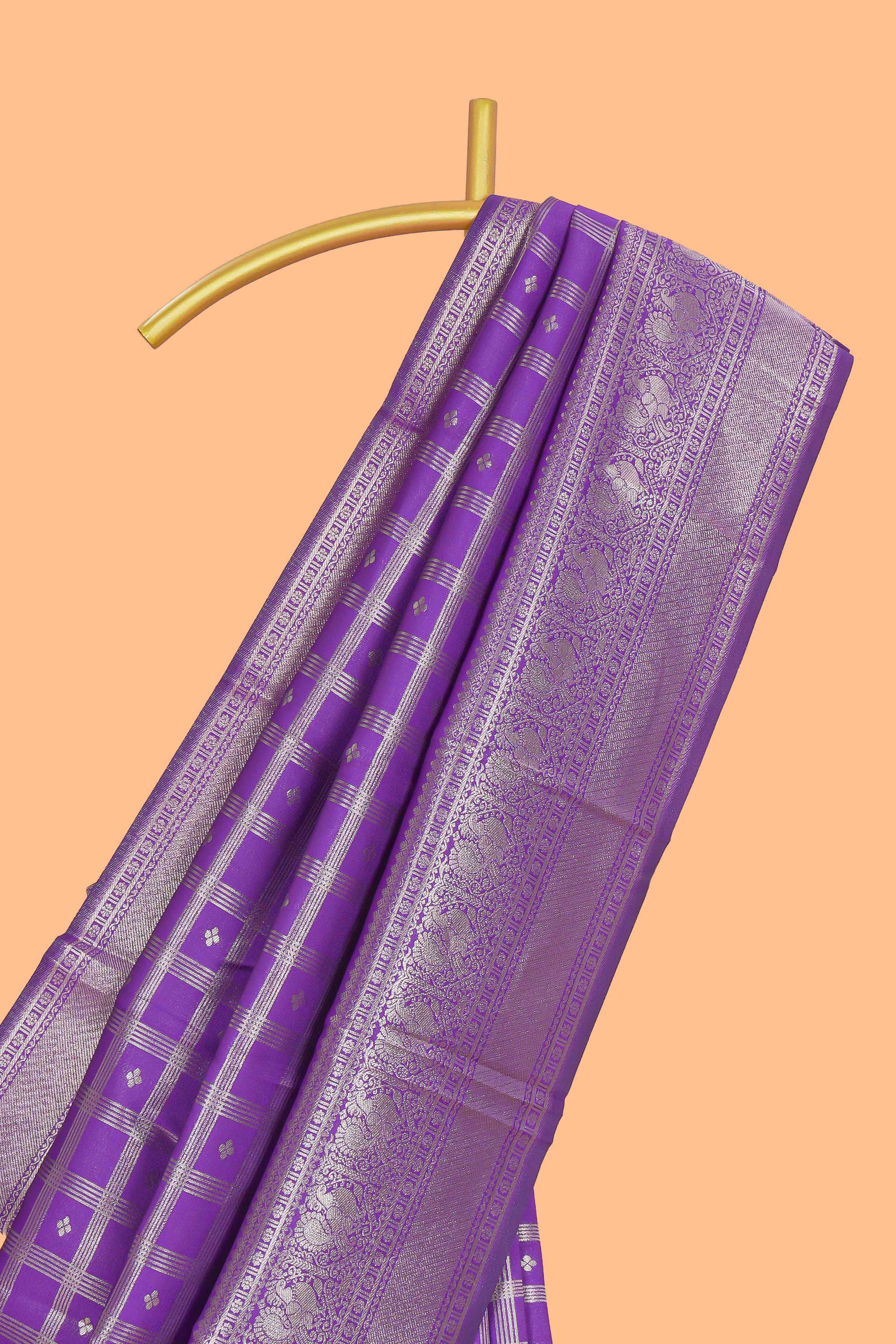 Lavender checked floral motifs design art silk saree with self zari border and matching motifs blouse