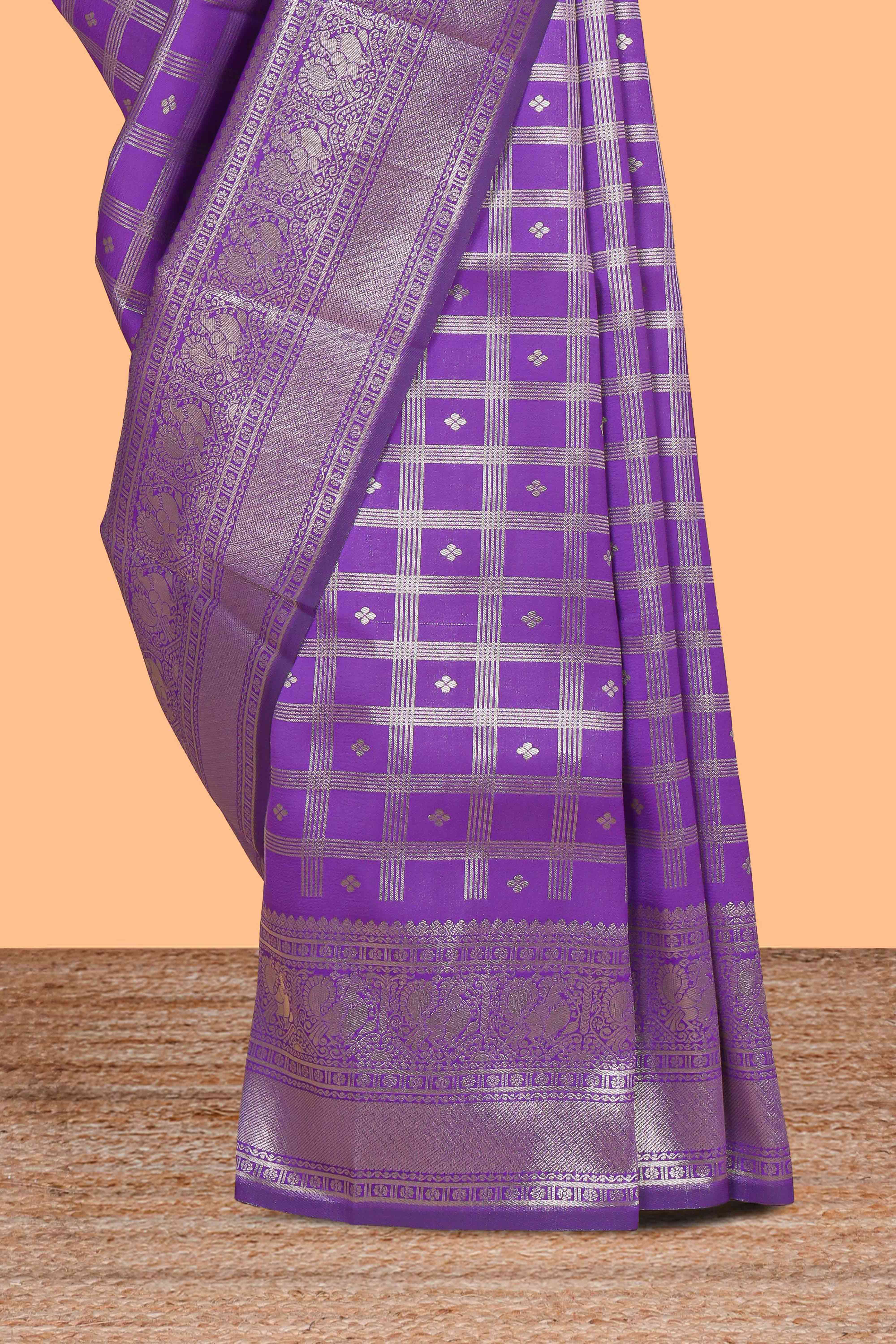 Lavender checked floral motifs design art silk saree with self zari border and matching motifs blouse