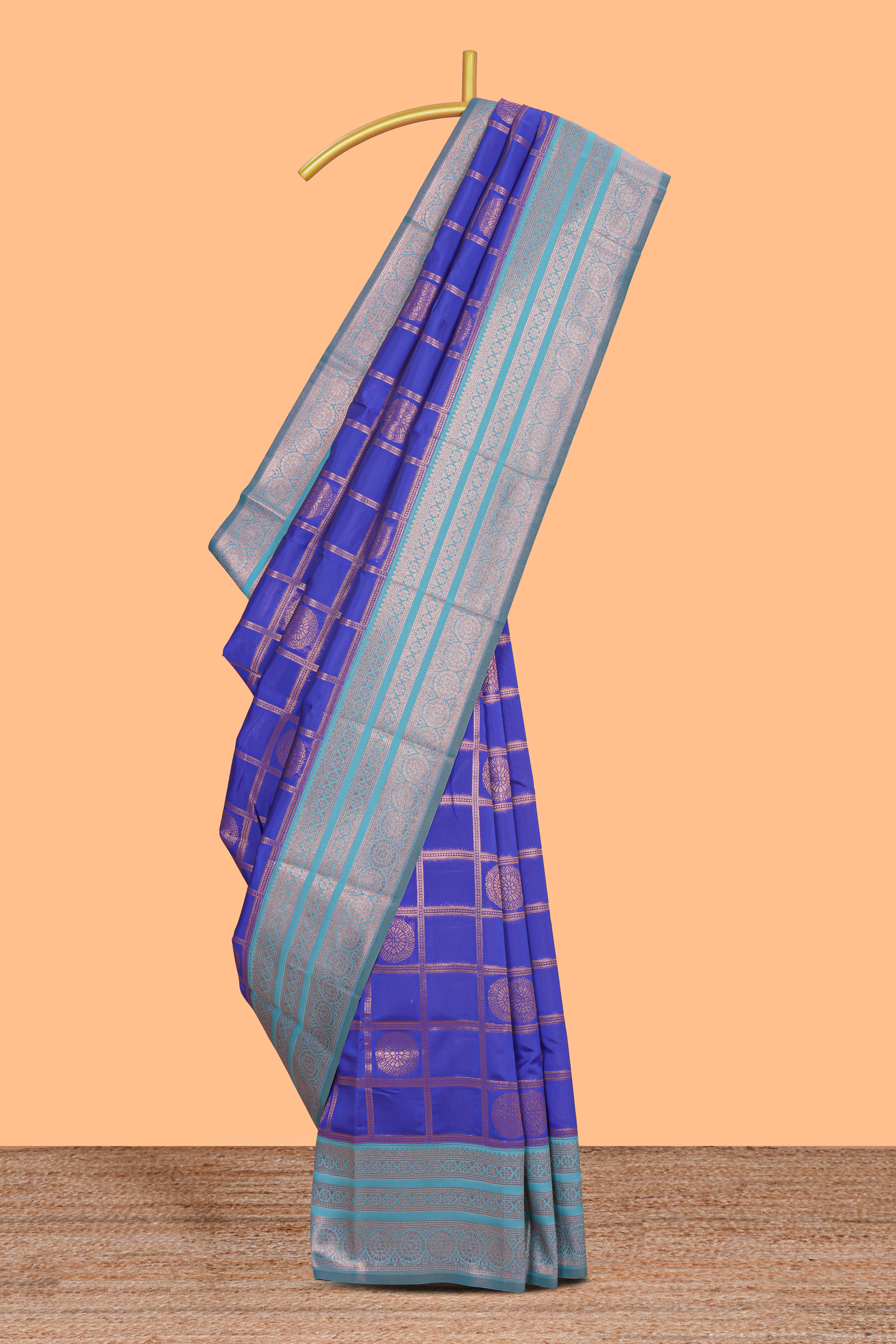 Blue checked floral motifs design art silk saree with contrast zari border and motifs blouse
