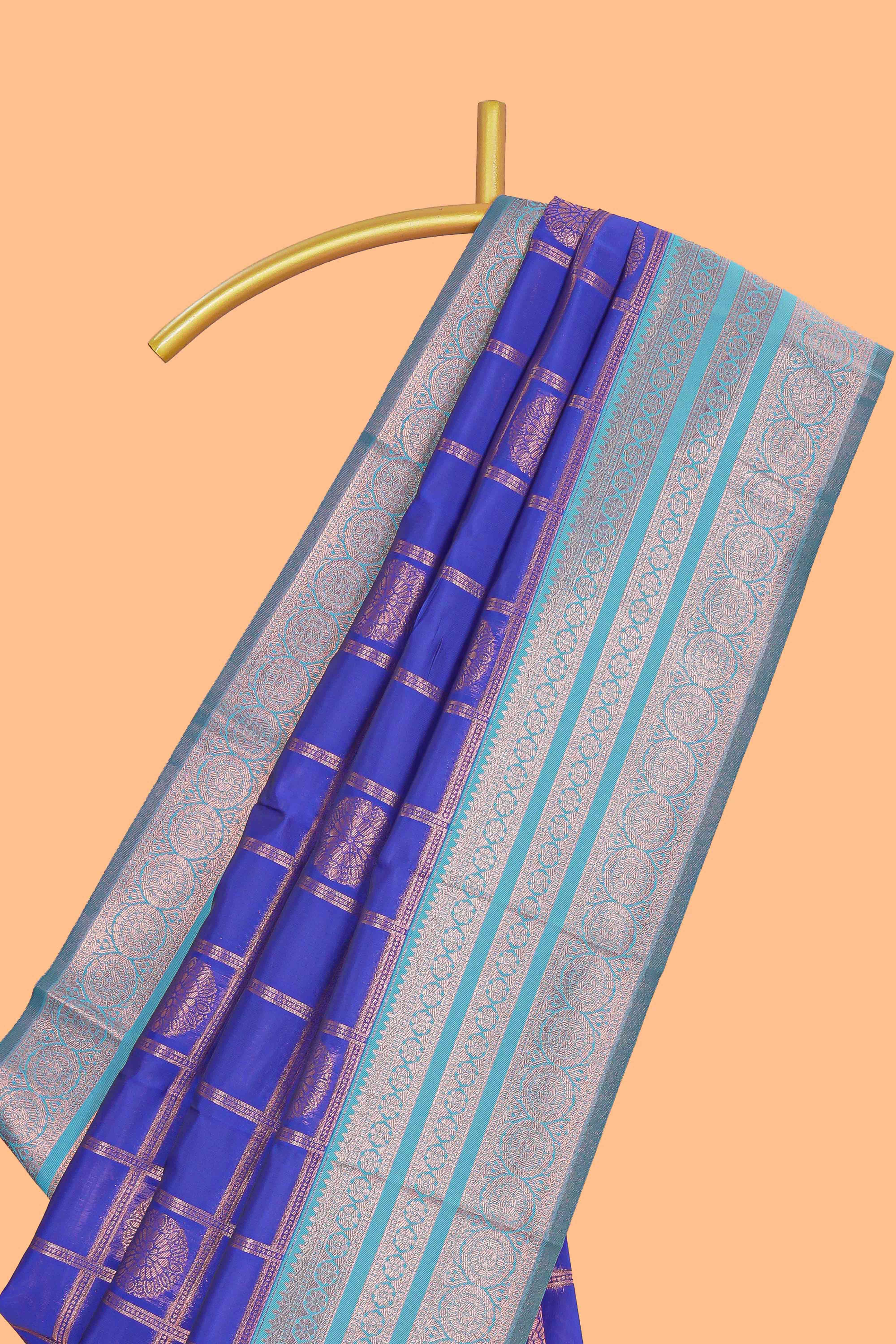 Blue checked floral motifs design art silk saree with contrast zari border and motifs blouse