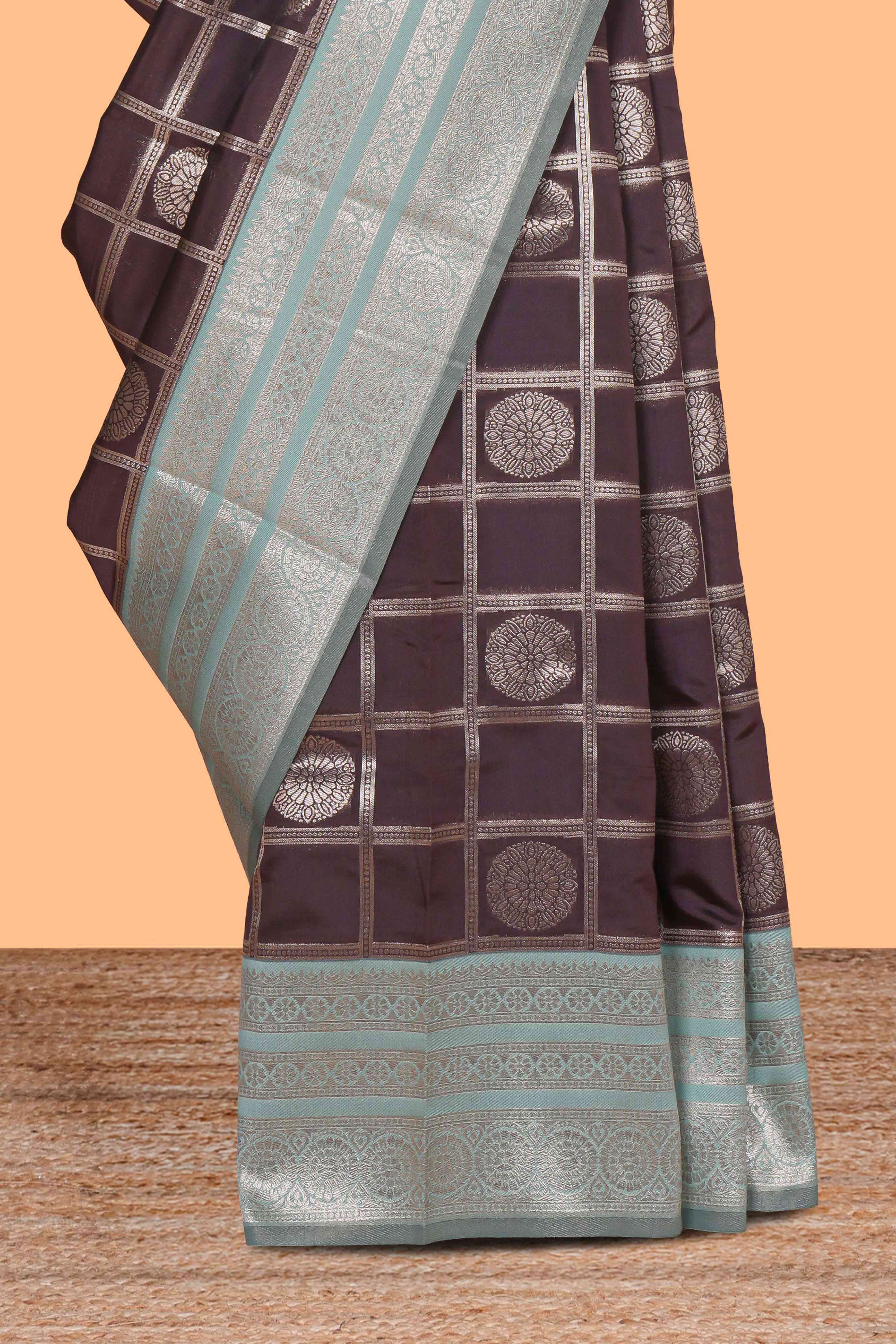 Dark brown checked floral & peacock motifs design art silk saree with contrast zari border and motifs blouse