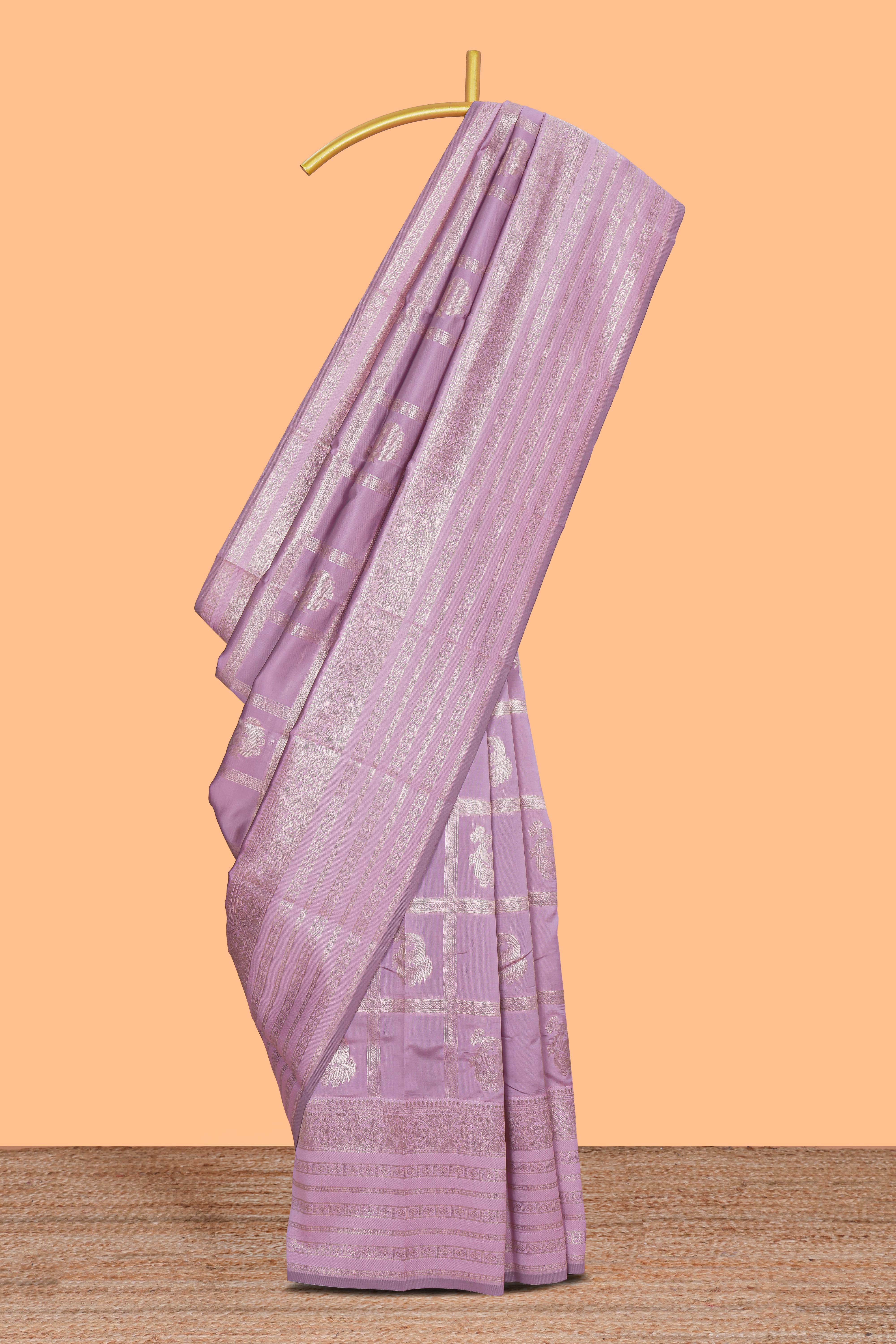 Lavender checked birds motifs design art silk saree with self zari border and matching motifs blouse