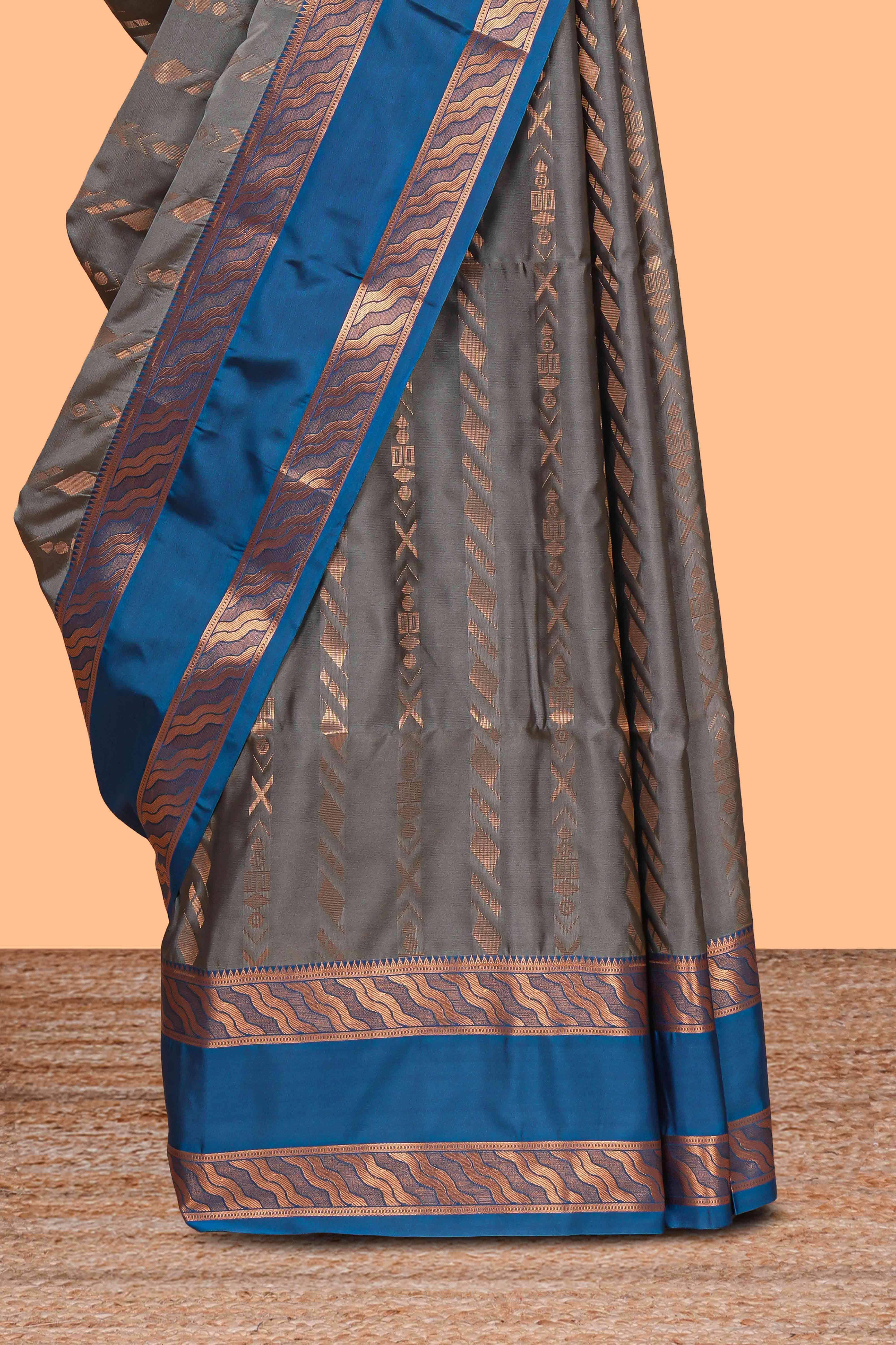 Grey striped zari design art silk saree with contrast zari border and blouse
