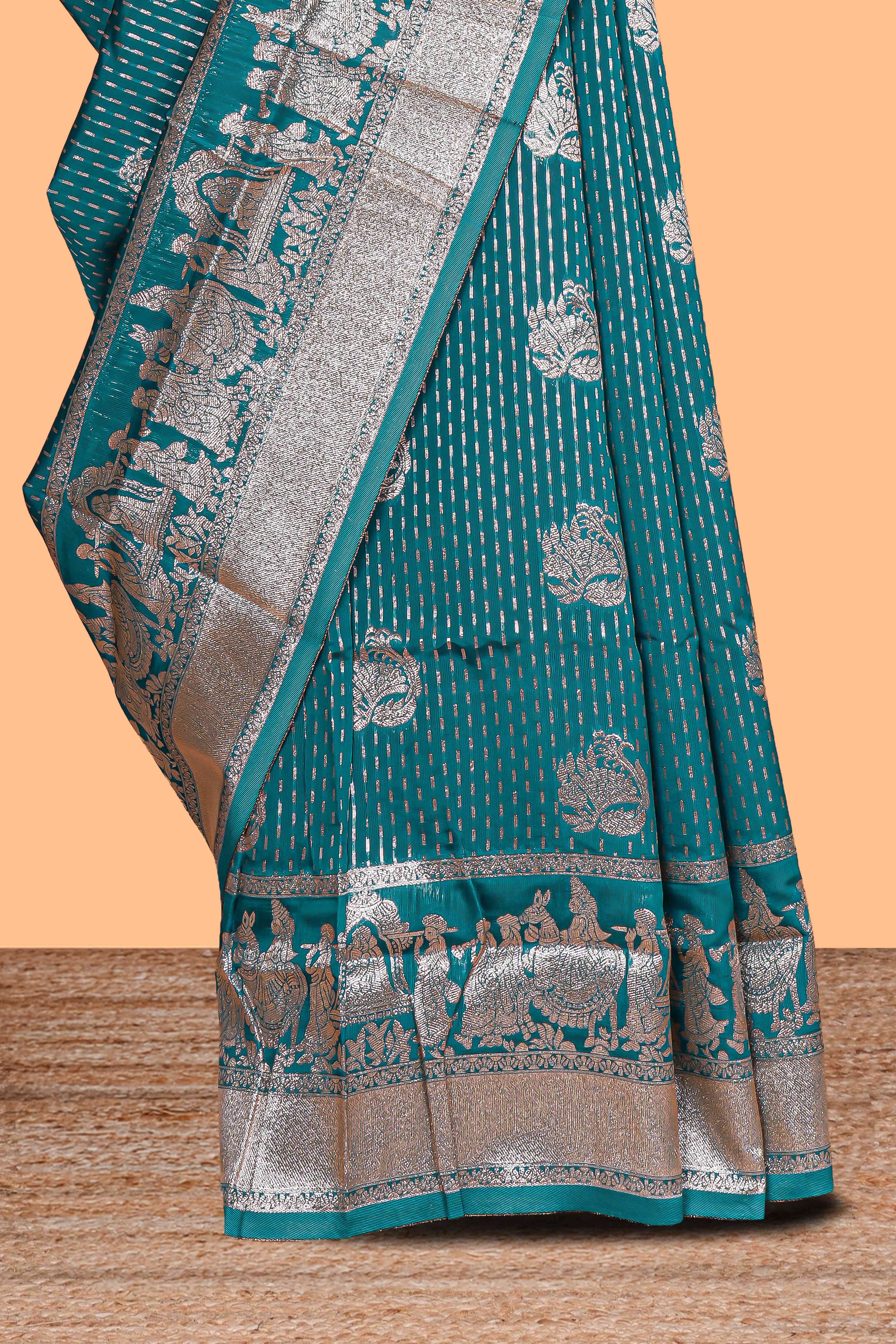 Green floral motifs design art silk saree with self traditional palak design border and contrast blouse
