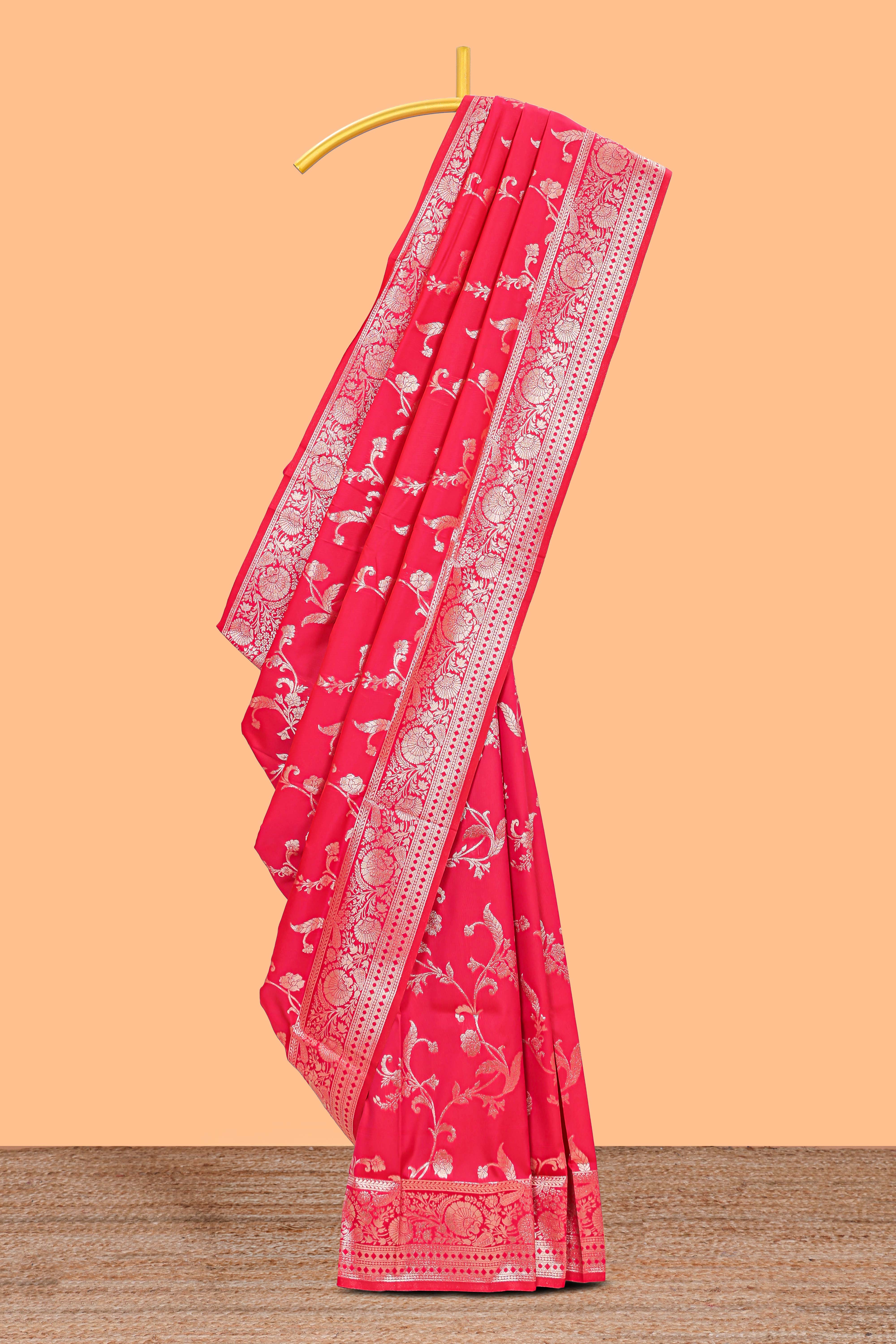 Rani pink floral design art silk saree with self zari border and motifs blouse