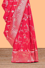 Rani pink floral design art silk saree with self zari border and motifs blouse
