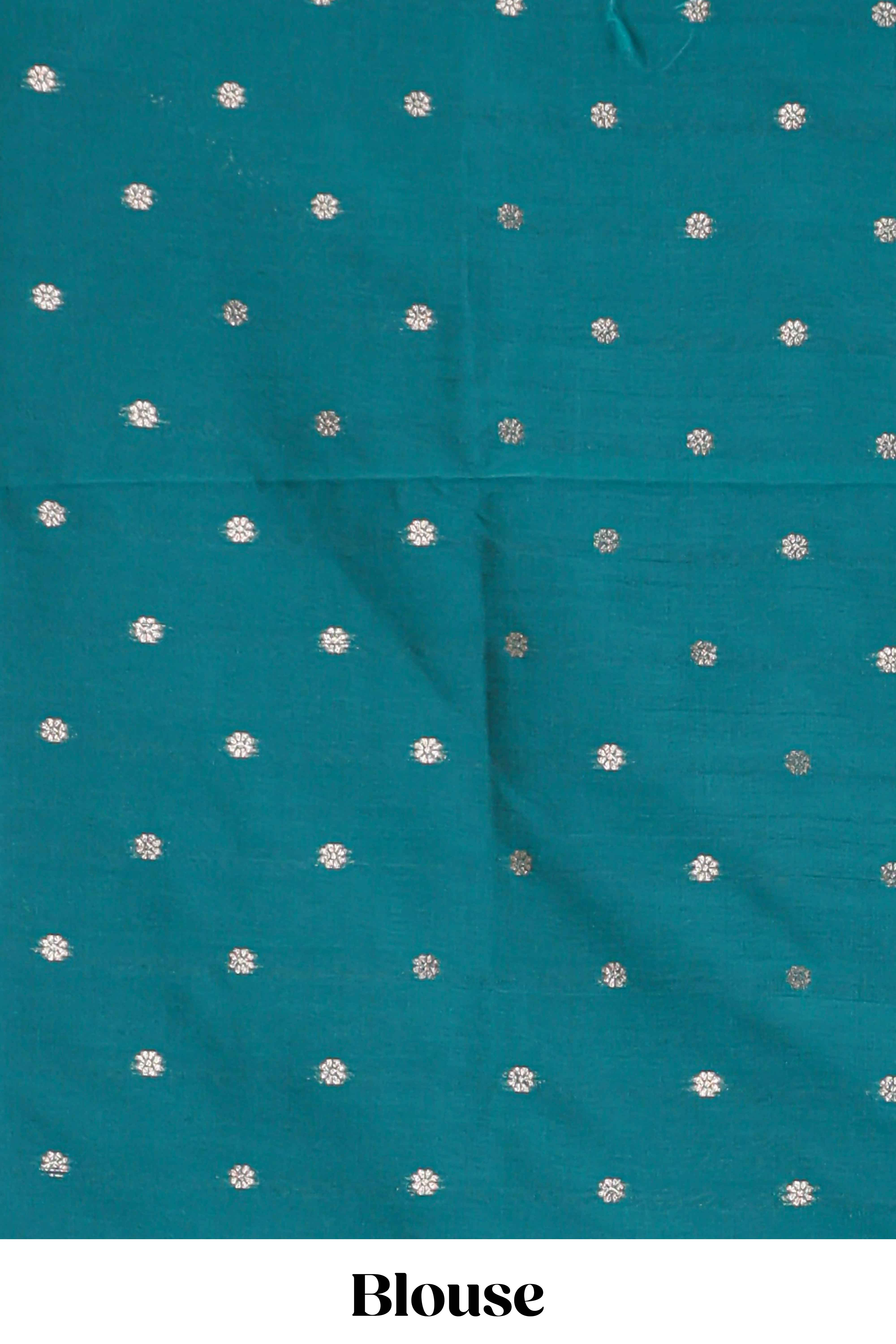 Green floral design art silk saree with self zari border and matching motifs blouse