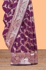 Purple floral design art silk saree with self zari border and matching motifs blouse